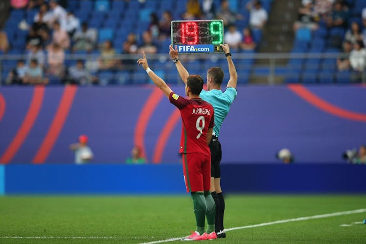Portugese national football player Ribeiro being substituted on during a match
