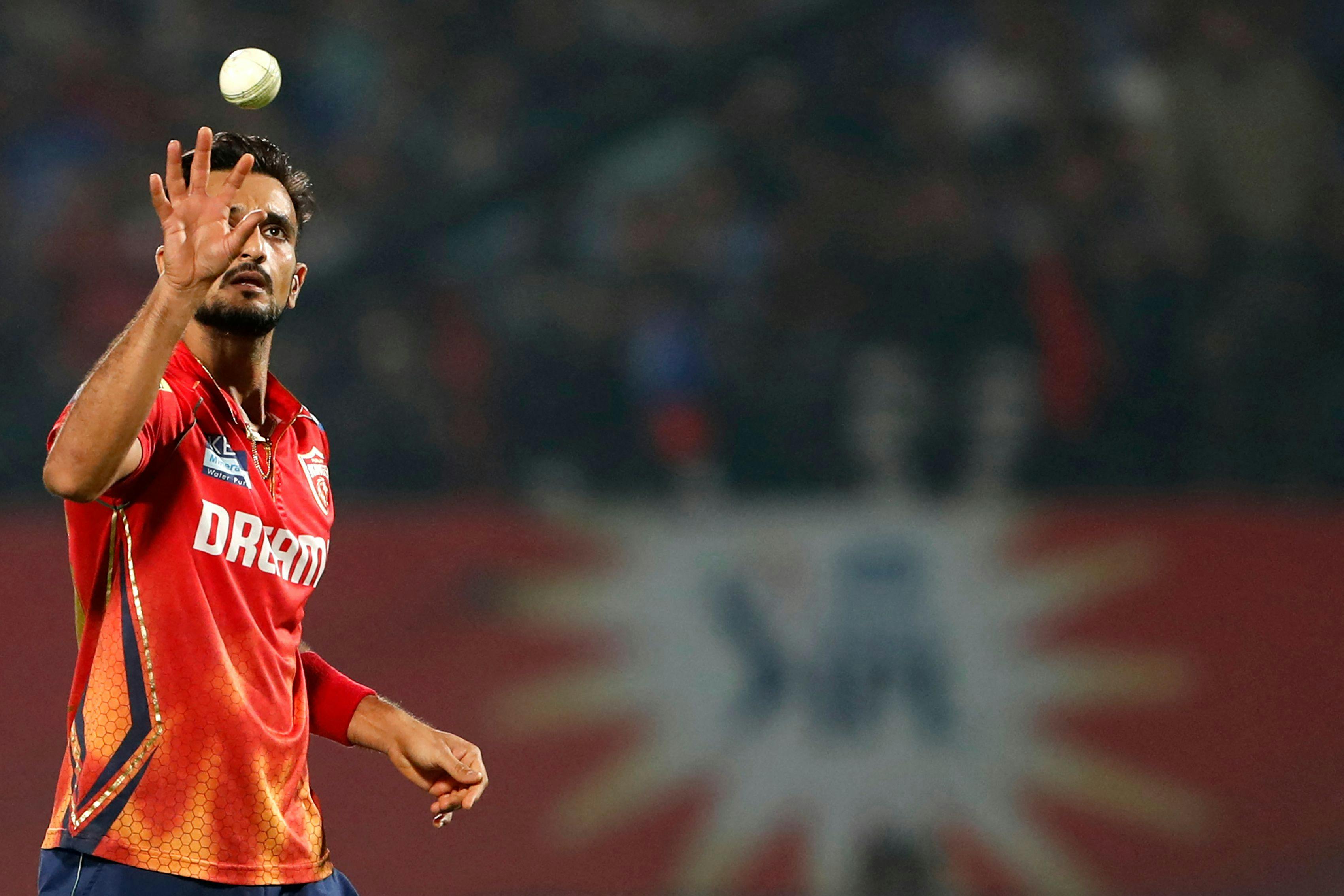 Punjab Kings' Harshal Patel catches the ball during the Indian Premier League 