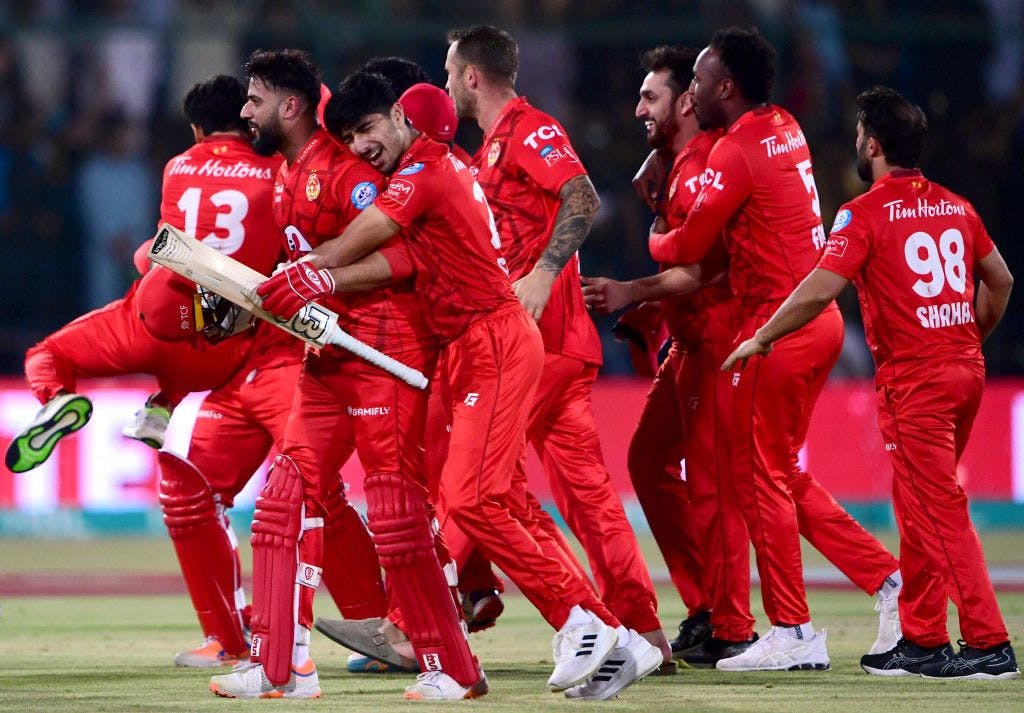 Islamabad United's players celebrate their victory at the end of the Pakistan Super League.