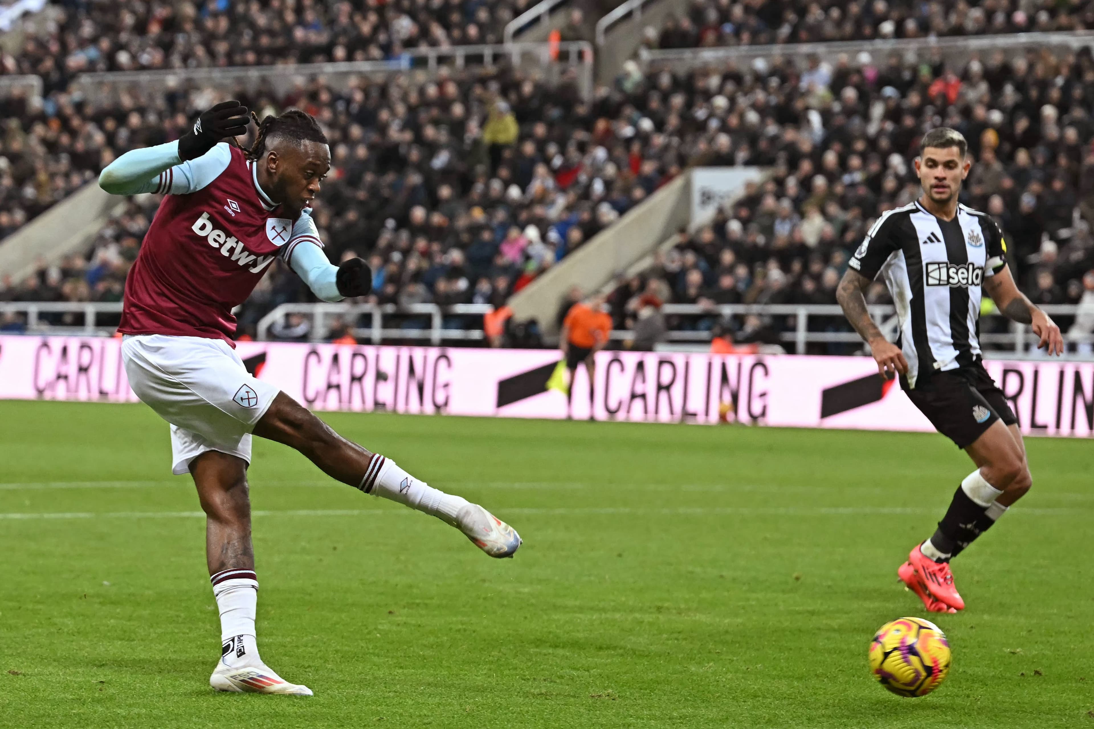 Aaron Wan-Bissaka shoots to score their second goal 