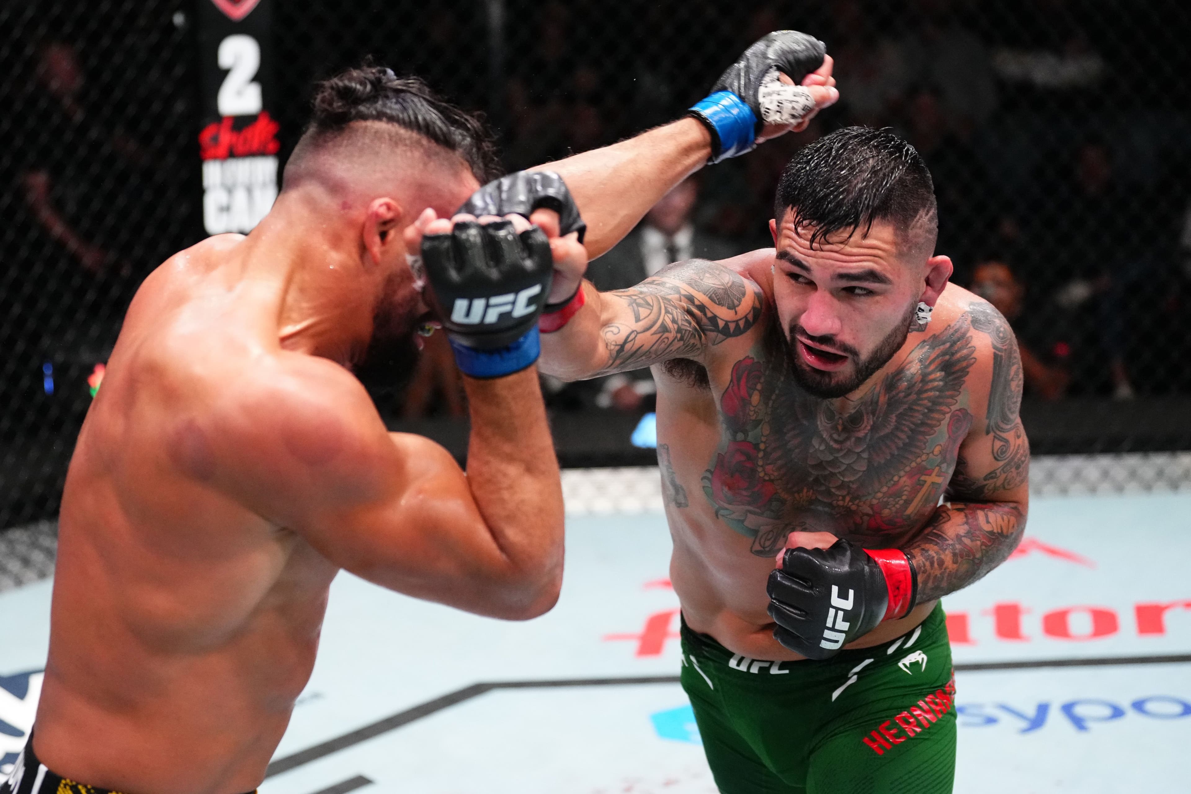  Anthony Hernandez punches Michel Pereira