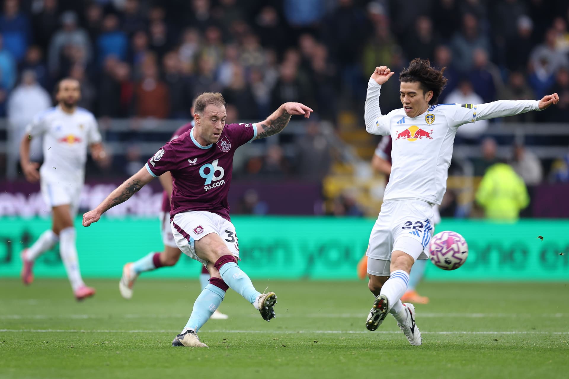 Ashley Barnes of Burnley passes the ball 