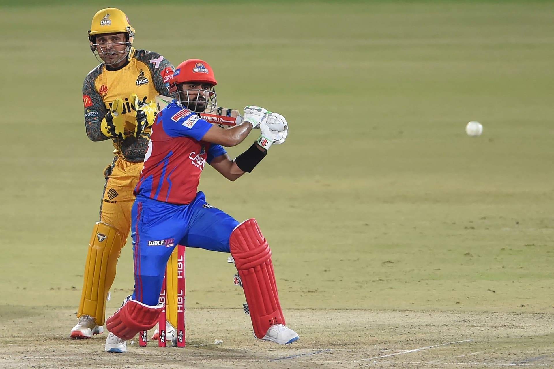 Babar Azam (R) plays a shot.jpg