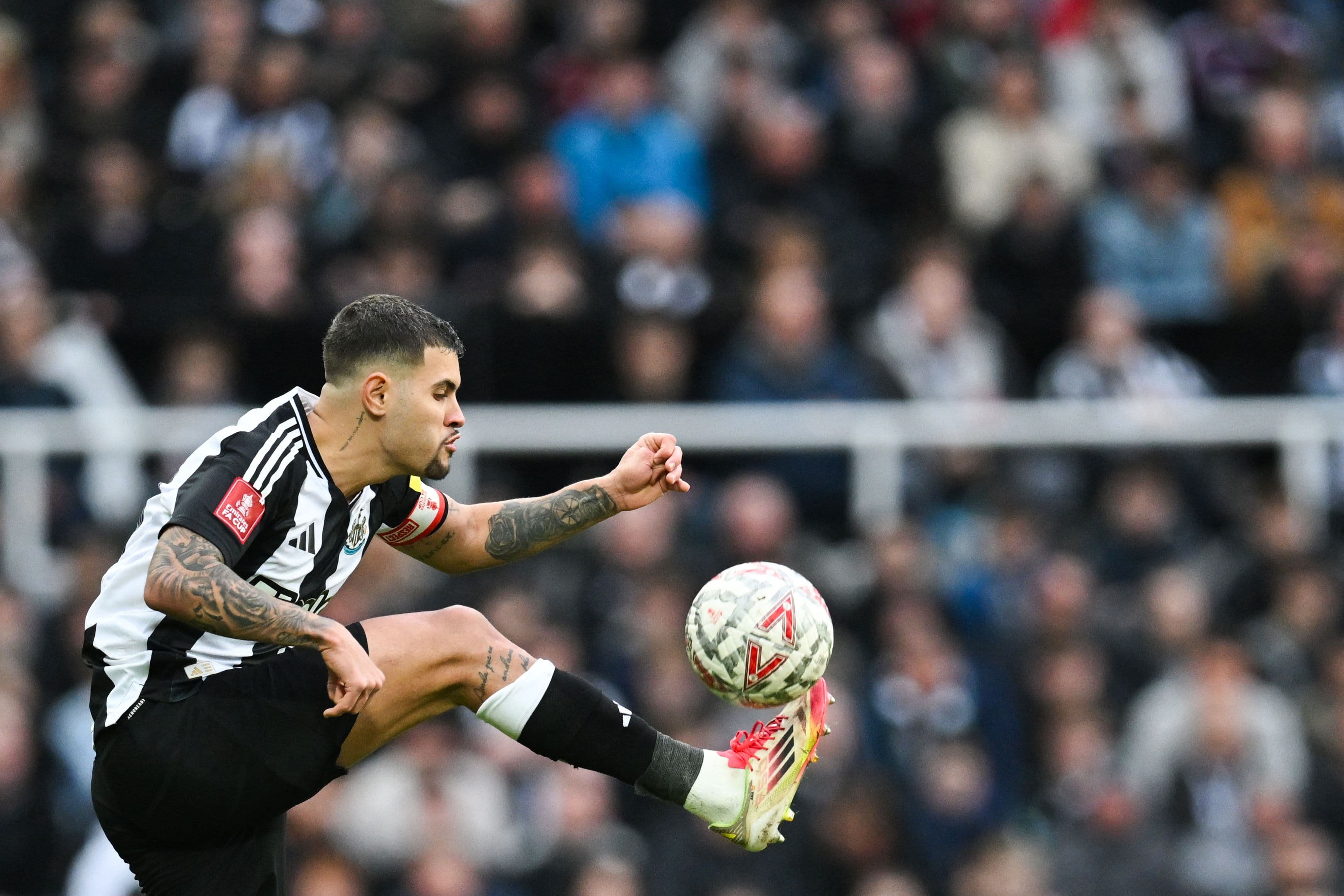 Bruno Guimaraes controls the ball.jpg