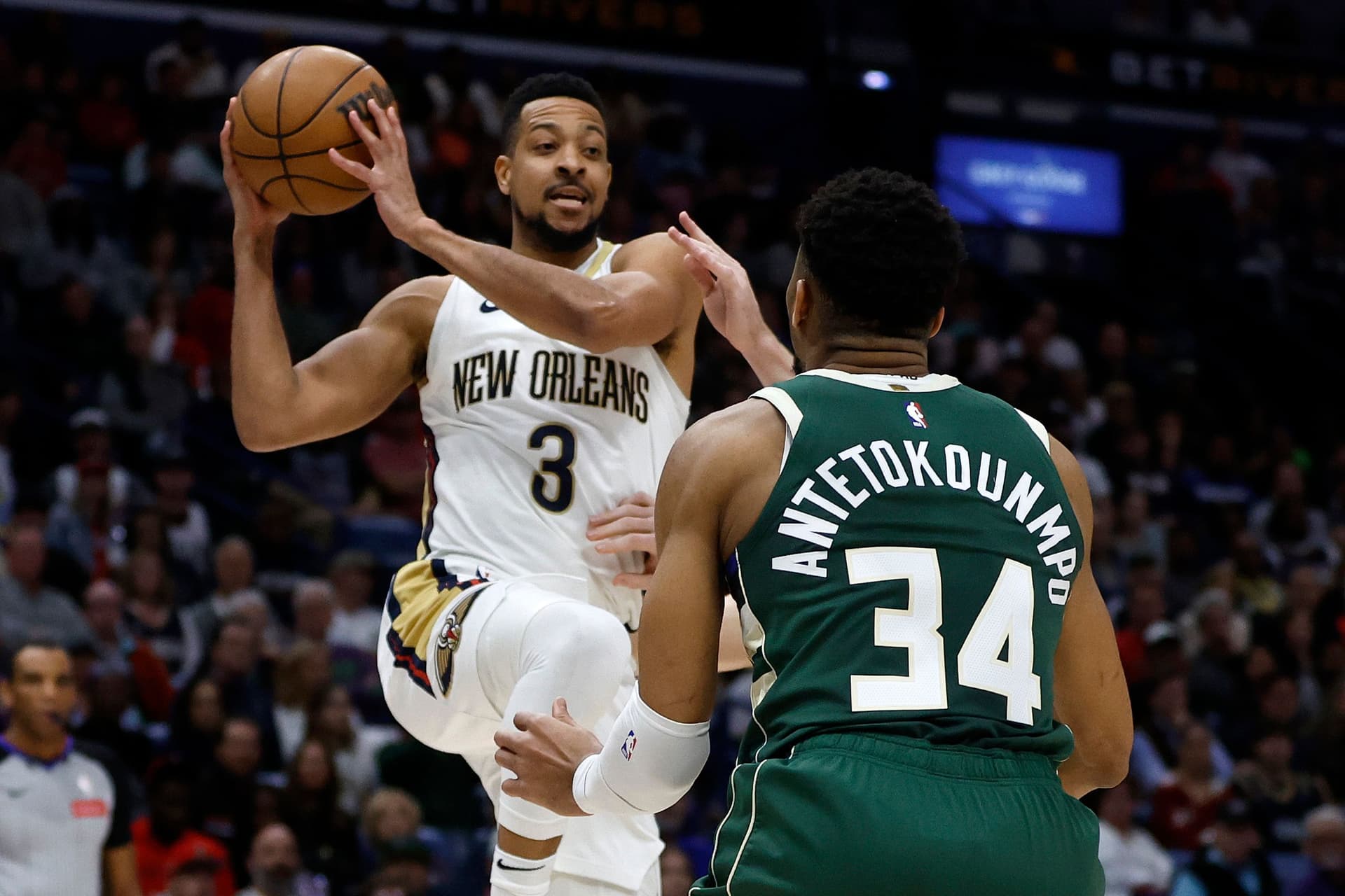 CJ McCollum and Giannis Antetokounmpo.jpg