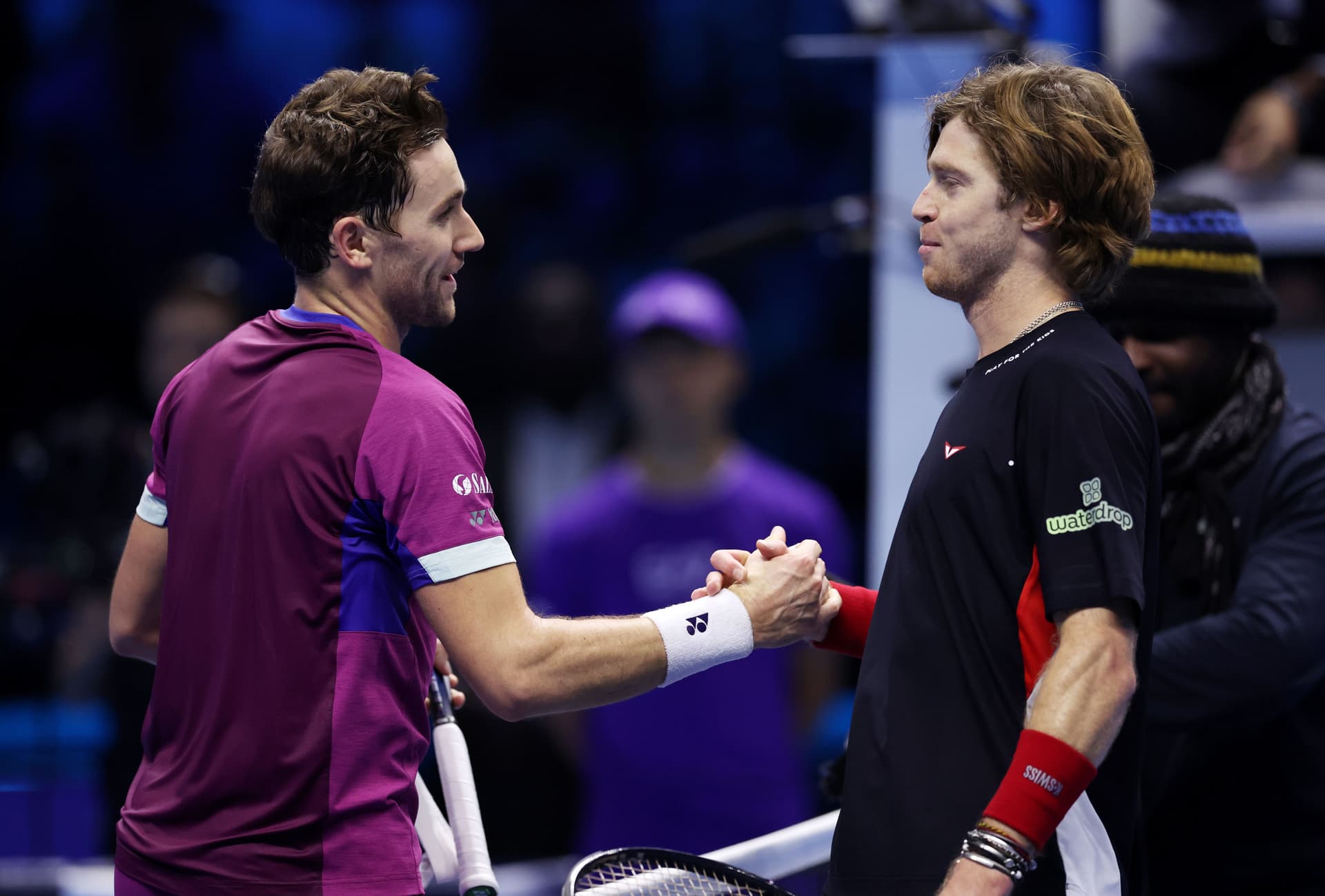 Casper Ruud of Norway shakes hands with Andrey Rublev