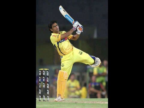 Dhoni launching the helicopter shot for CSK in IPL.jpeg