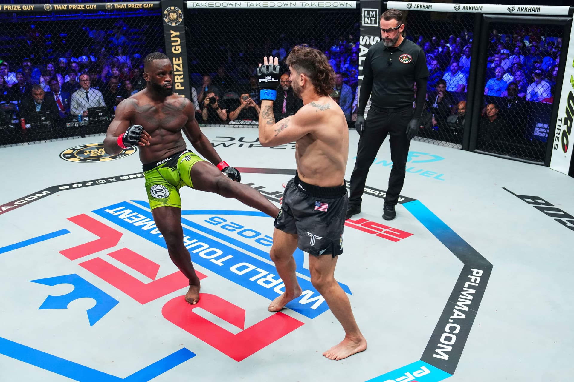 Fabian Edwards throws a kick against Josh Silveira