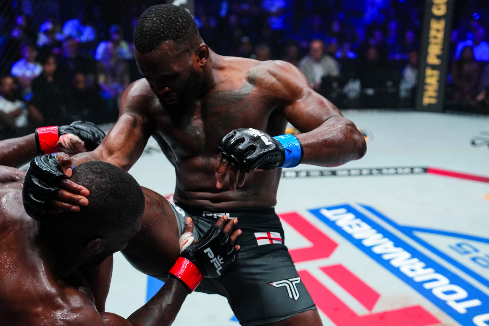 Fabian Edwards throws a knee against Impa Kasanganay