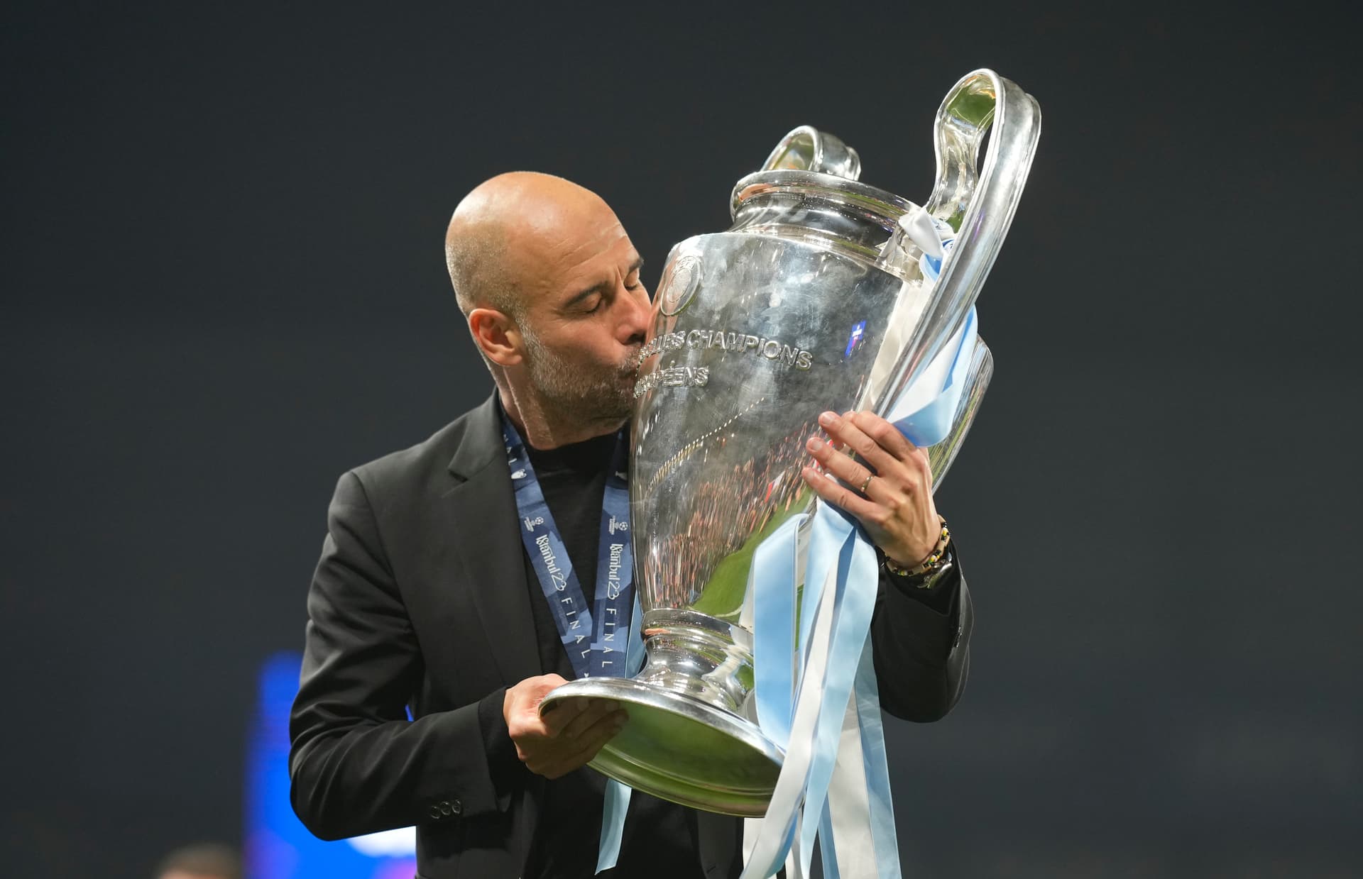 head coach Pep Guardiola of Manchester City poses 