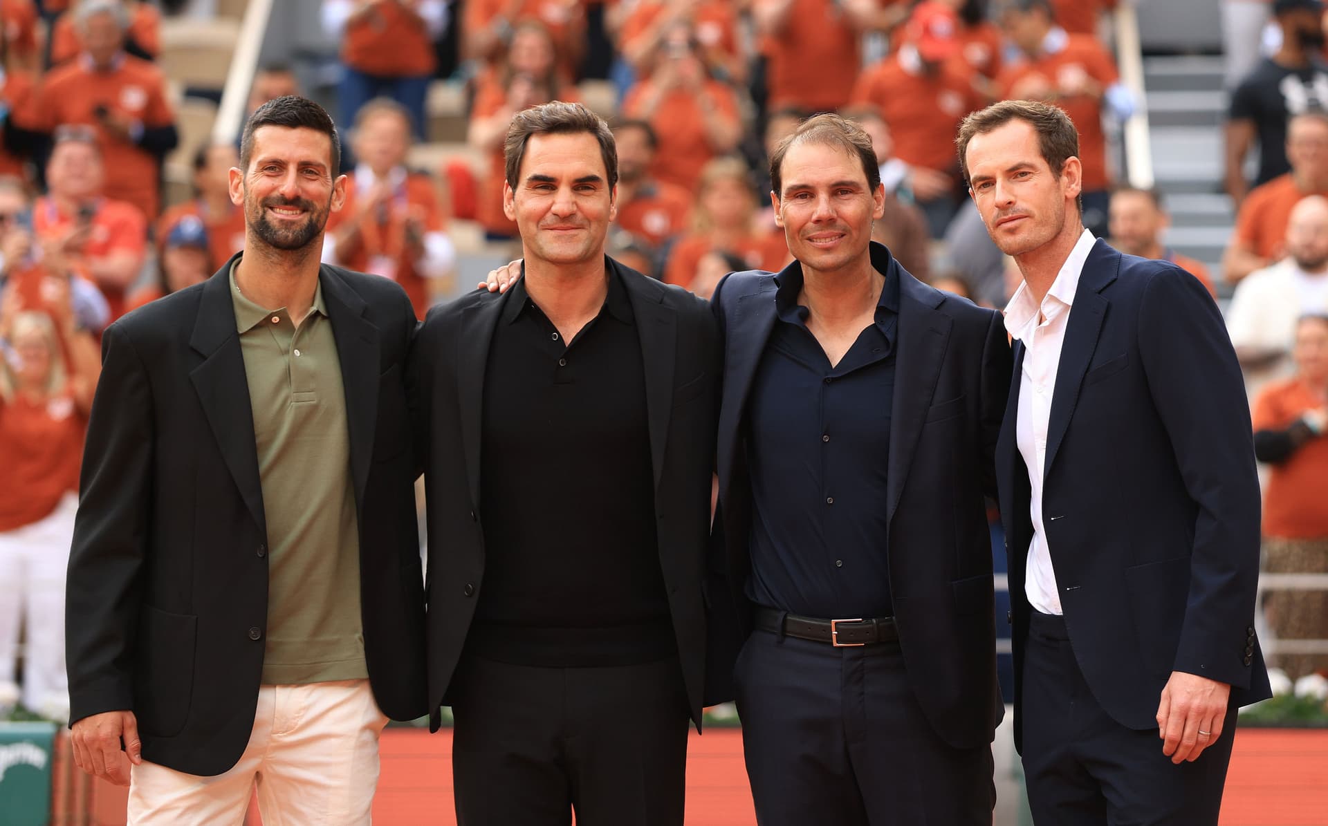 Rafael Nadal poses for a photo with Roger Federer, Novak Djokovic and Andy Murray on Court Philippe-Chatrier