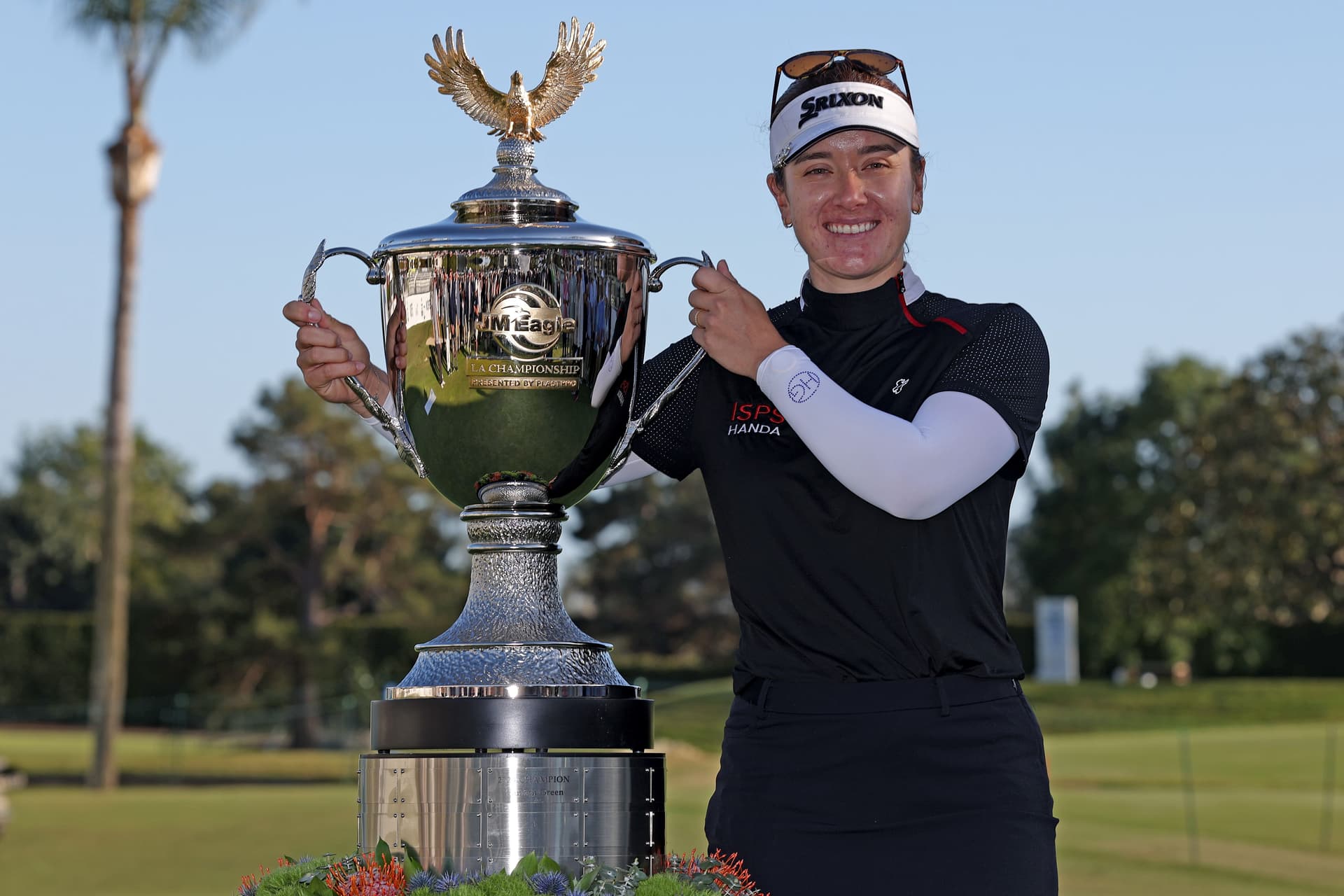 Hannah Green of Australia poses with the trophy