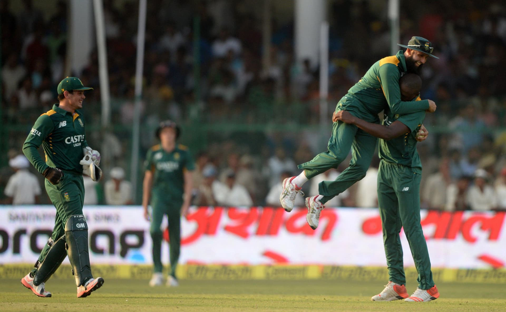 Hashim Amla celebrates with teammate Kagiso Rabada
