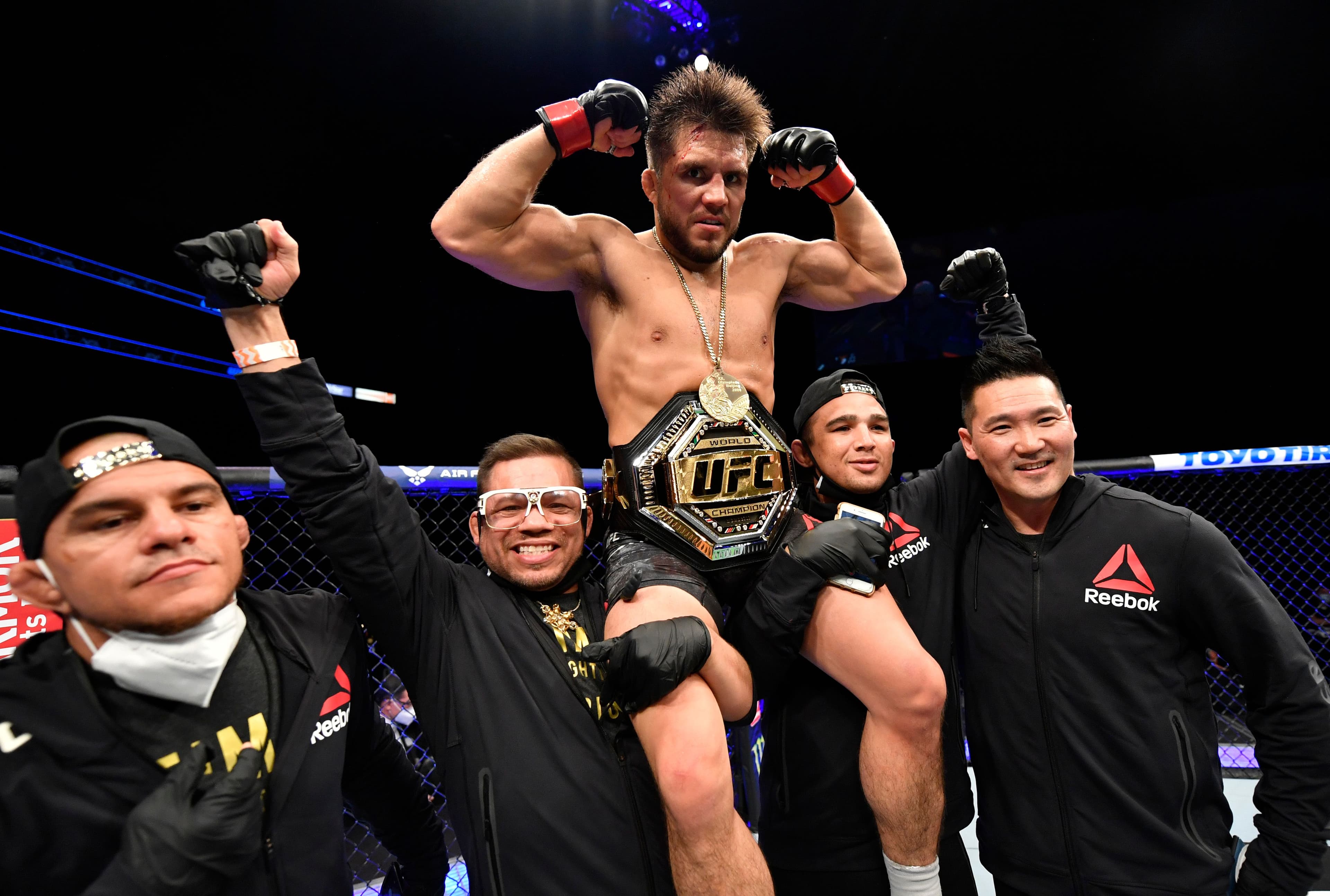 Henry Cejudo celebrating