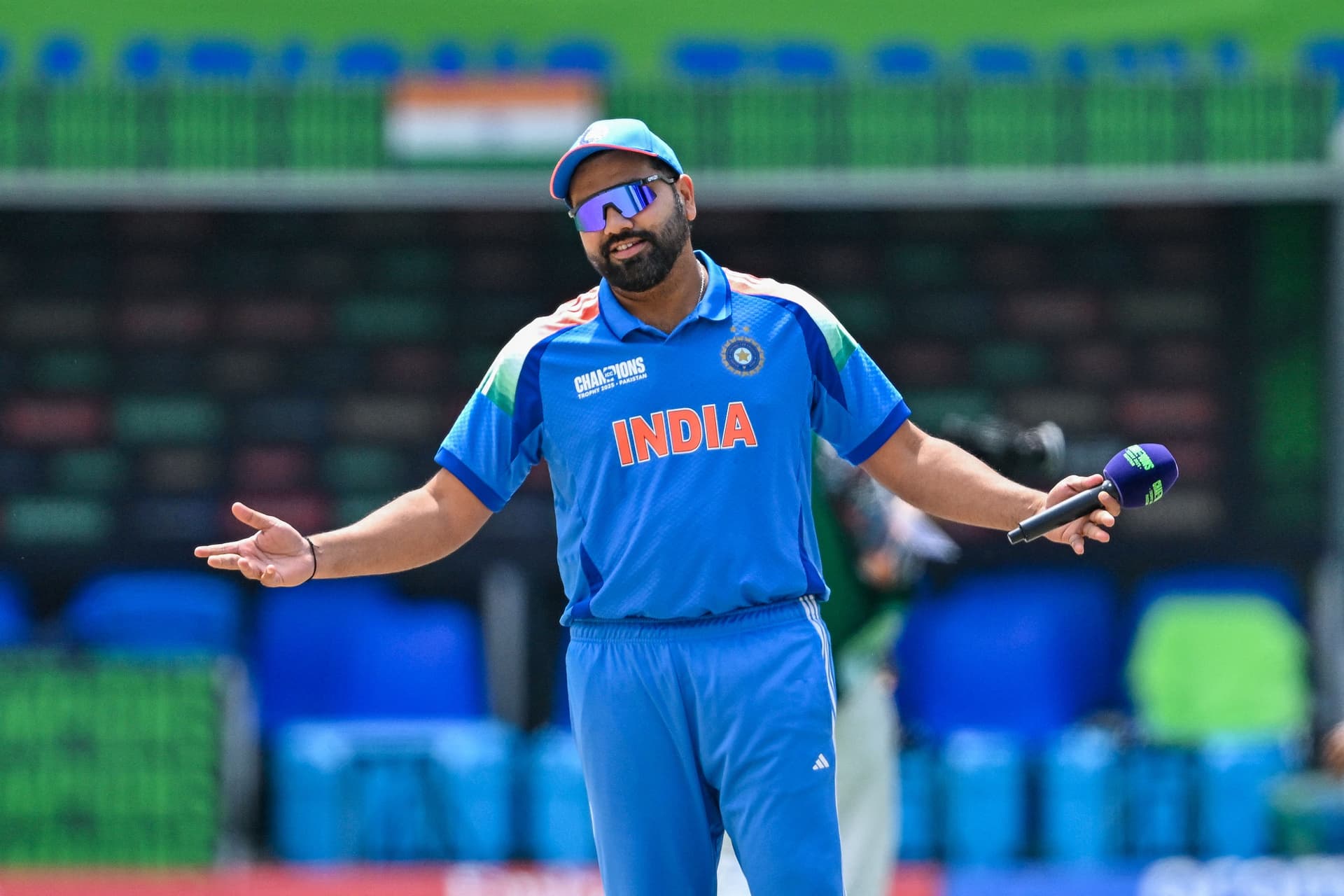 India's captain Rohit Sharma reacts after the toss