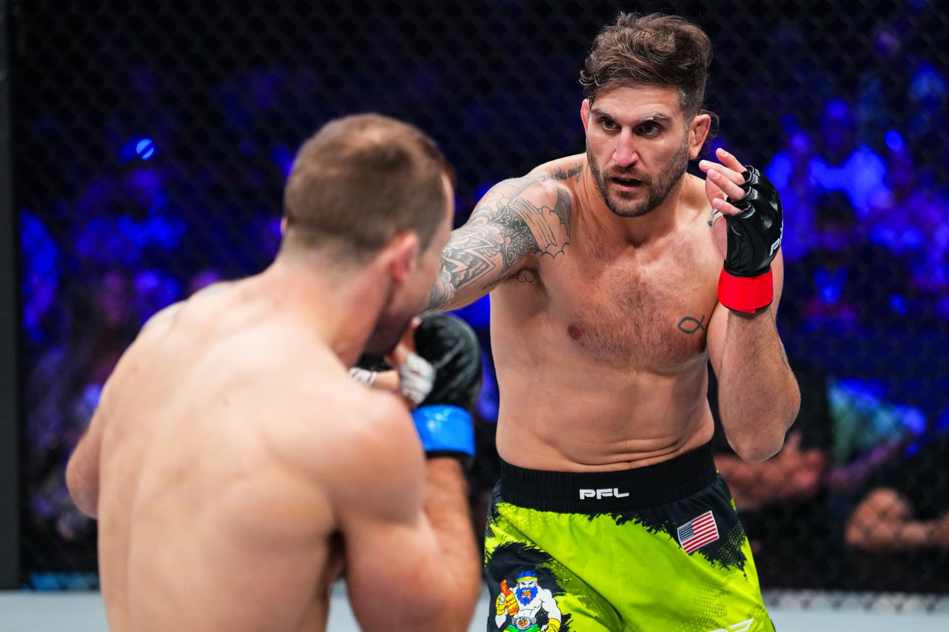 Josh Silveira throws a punch against Mike Shipman