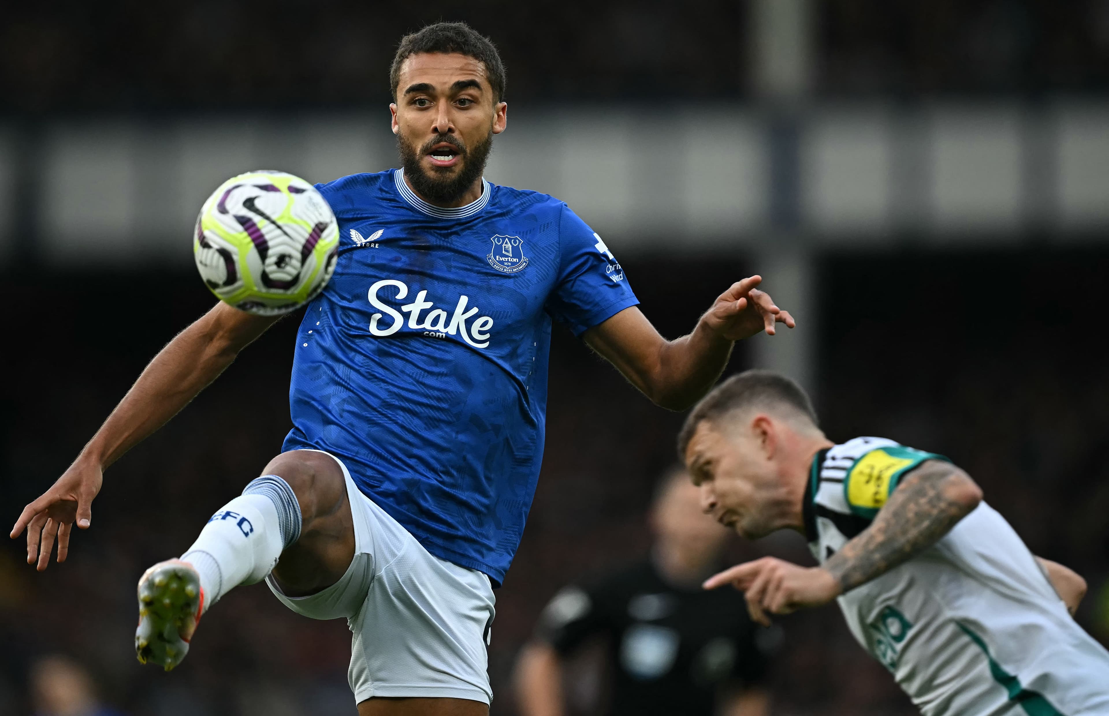 Kieran Trippier (R) vies with Dominic Calvert-Lewin.jpg