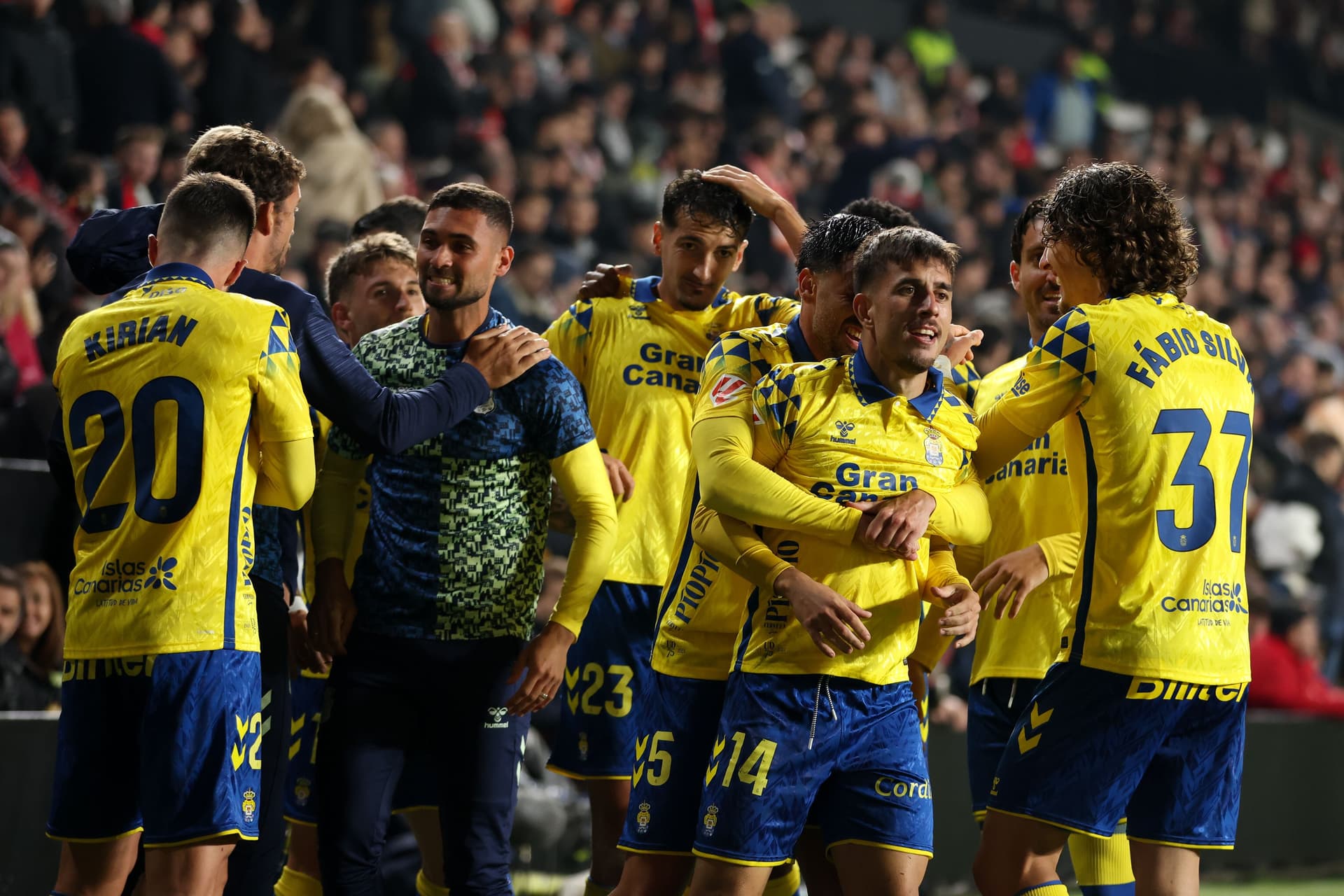 Manu Fuster of UD Las Palmas celebrates with teammates 