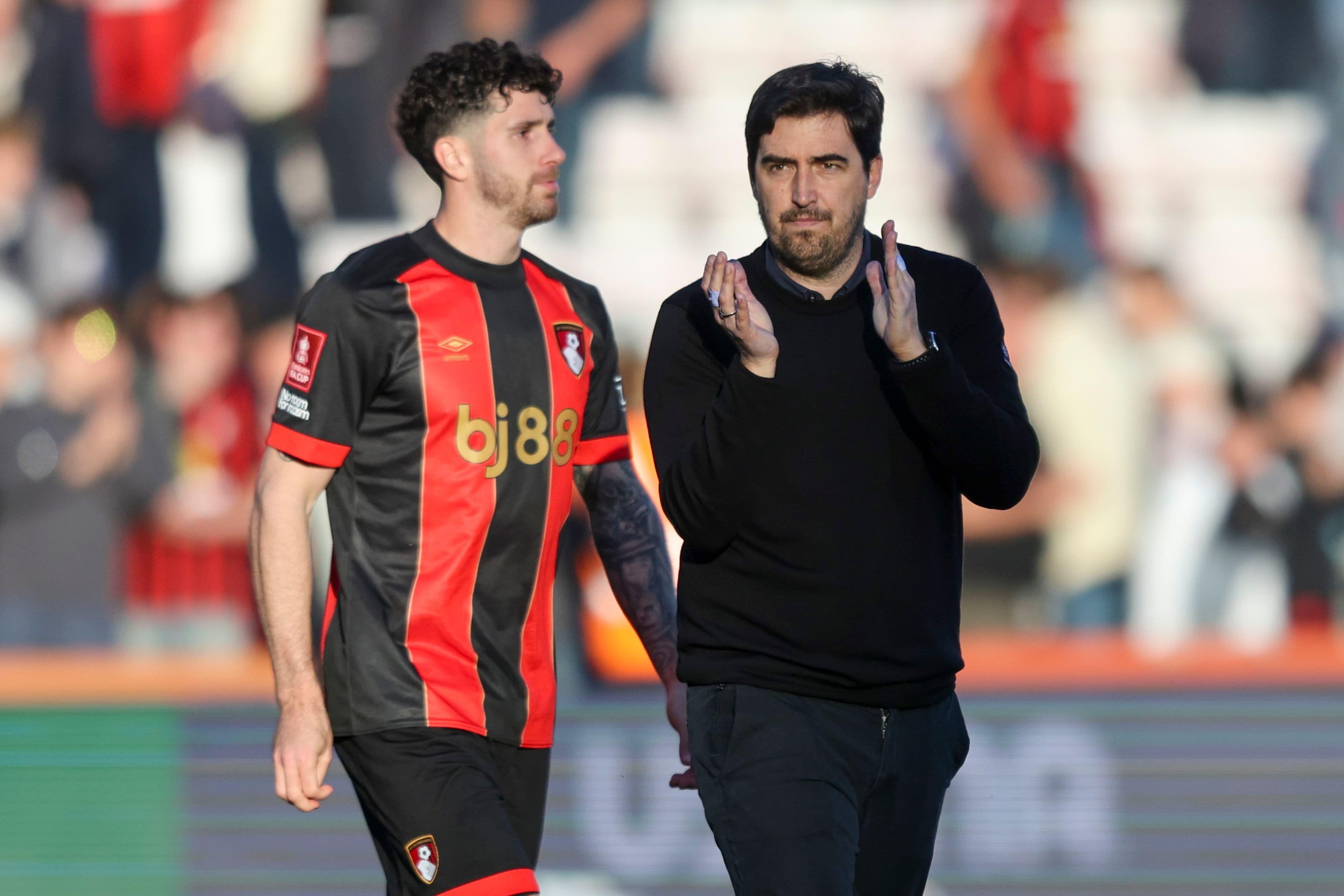 Marcos Senesi with Head Coach Andoni Iraola.jpg