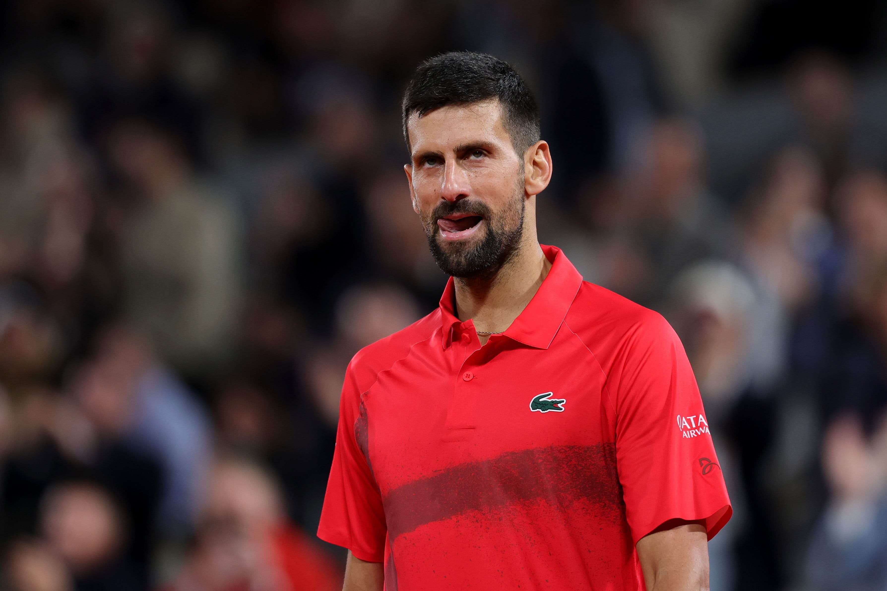 Novak Djokovic of Serbia reacts after winning a point