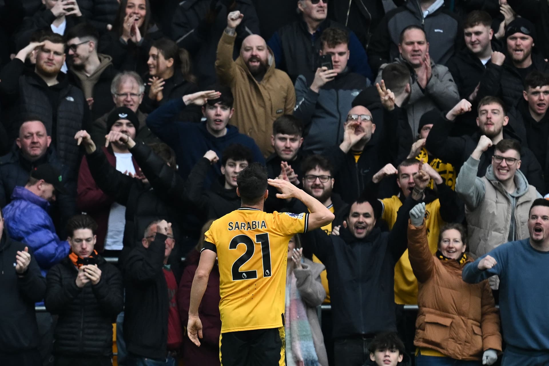 Pablo Sarabia celebrates in front of supporters