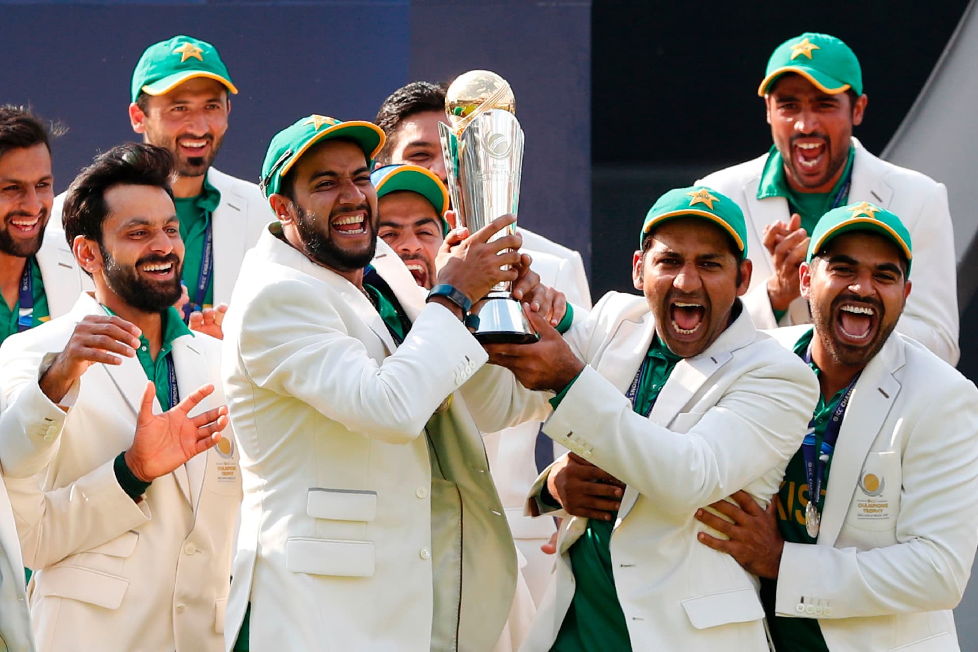 Pakistan players celebrating with ICC Champions Trophy