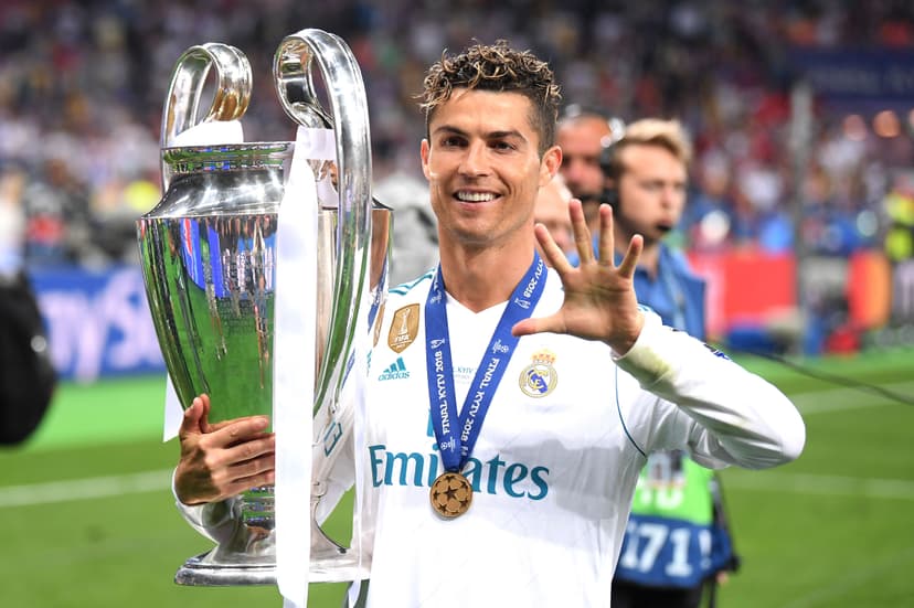 Cristiano Ronaldo of Real Madrid lifts The UEFA Champions League trophy 