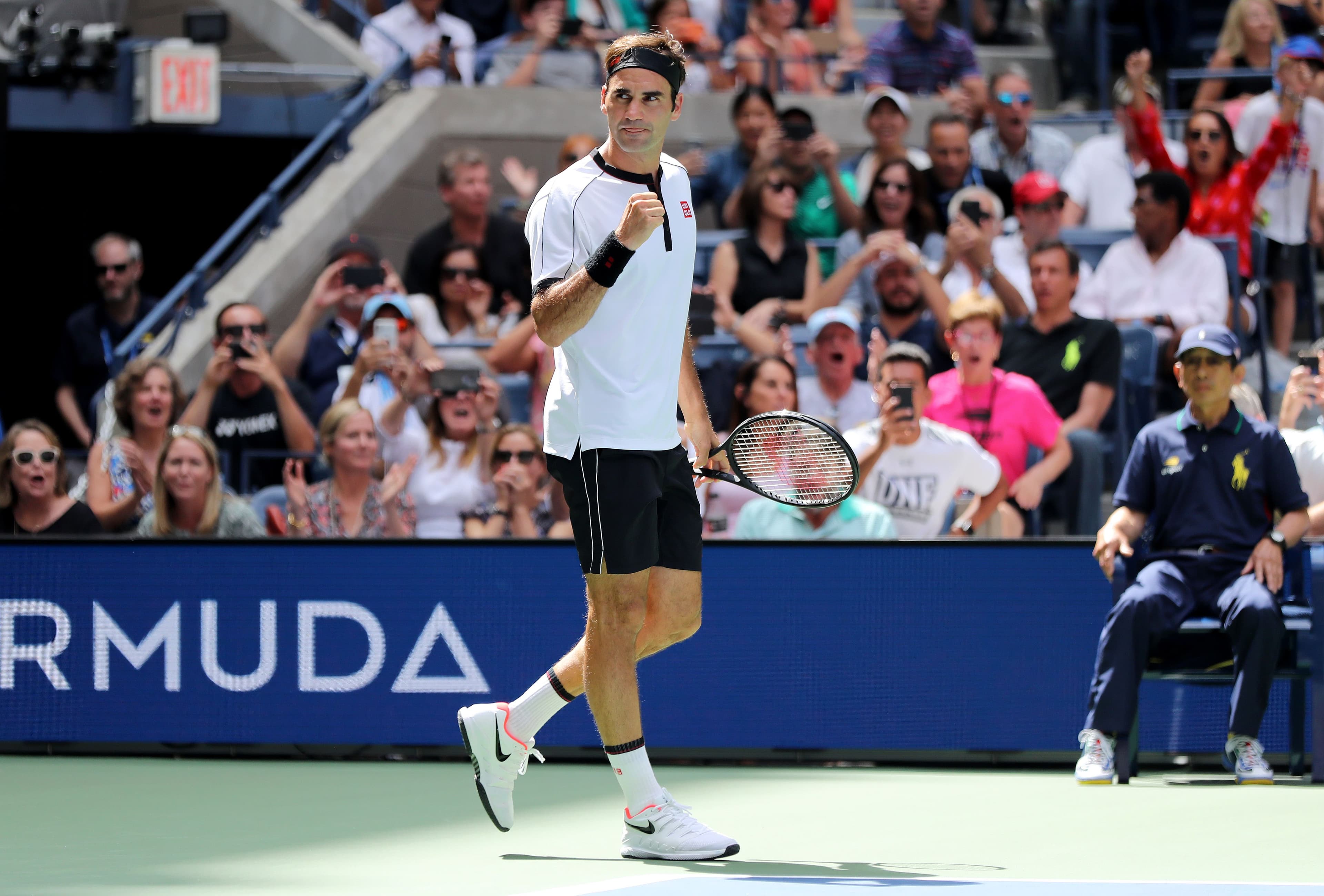 Roger Federer of Switzerland celebrates winning
