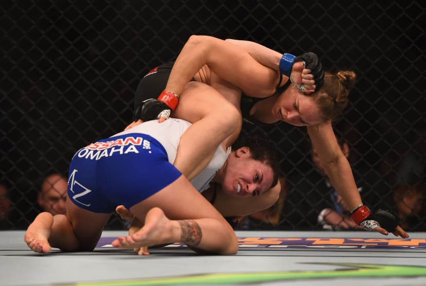 Ronda Rousey grapples with Cat Zingano