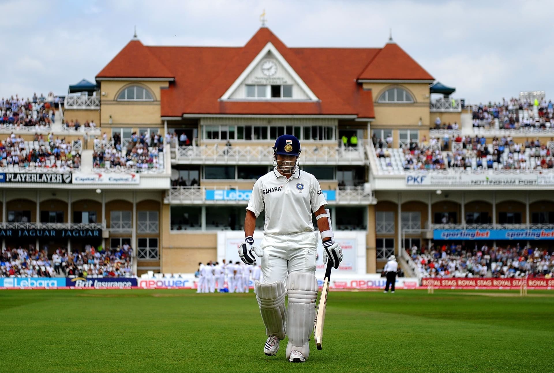 Sachin Tendulkar of India walks to the pavilion