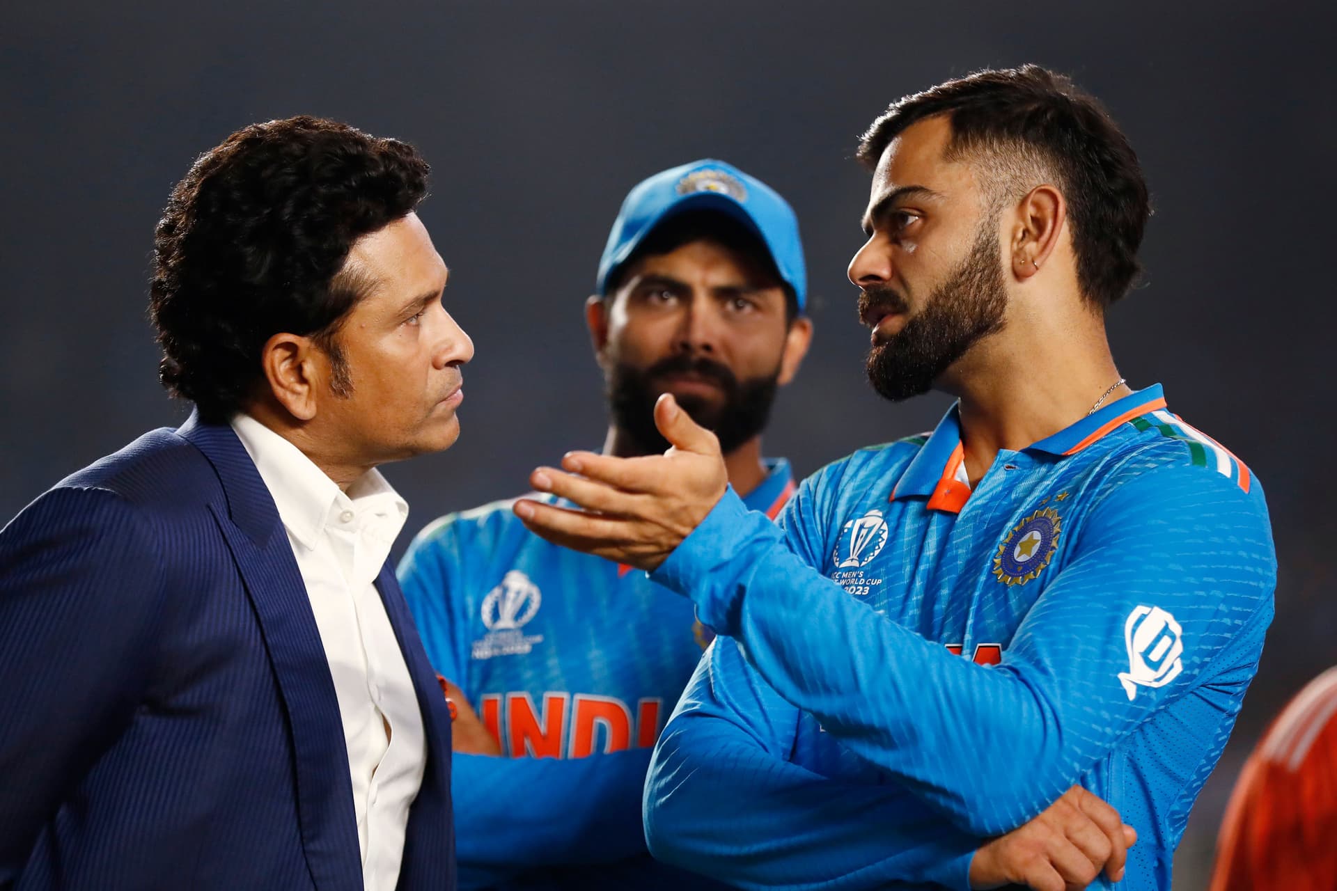 Sachin Tendulkar speaks with Virat Kohli