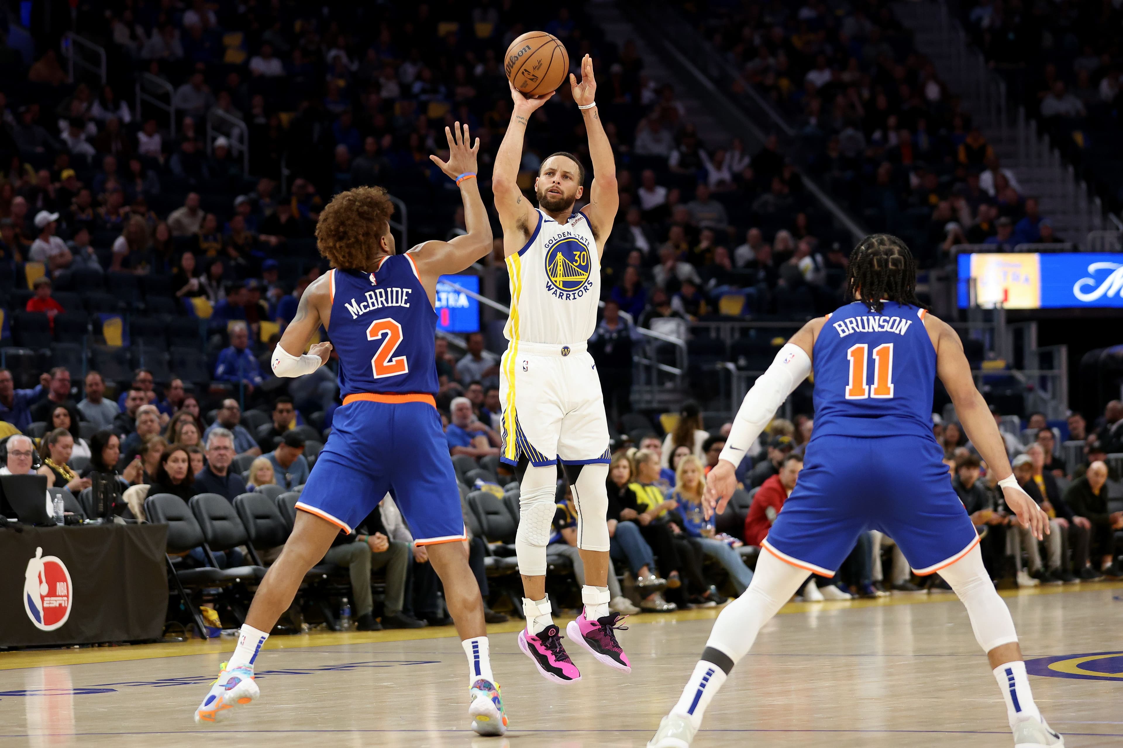 Stephen Curry and Miles McBrid