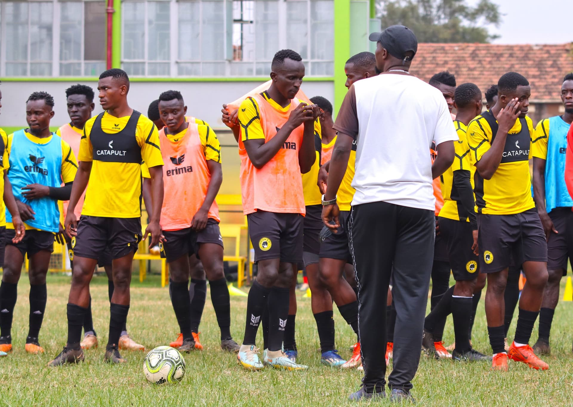 Tusker interim coach Charles Okere in white.jpg