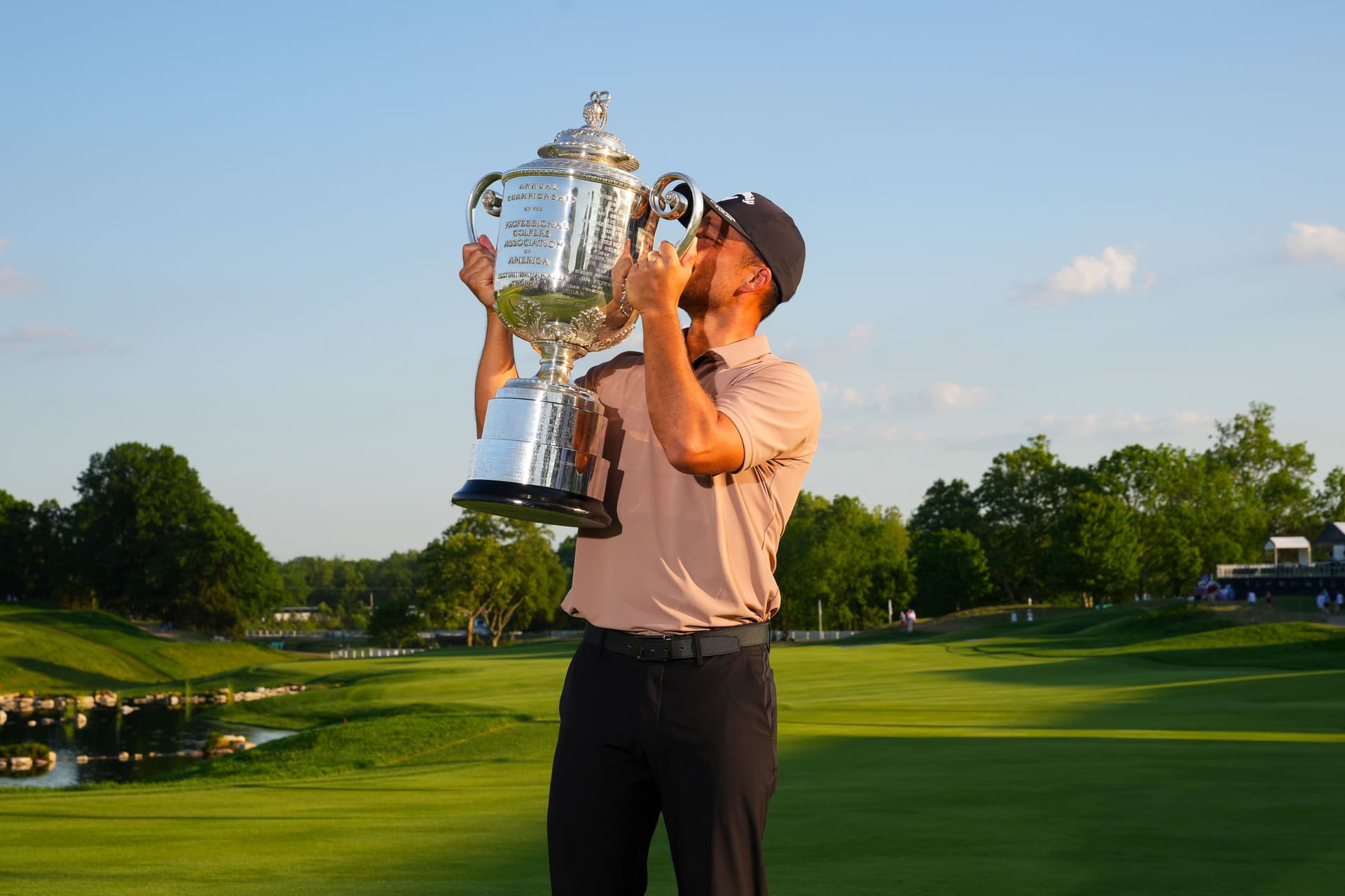 Xander Schauffele kisses the Wanamaker Trophy after his victory of the PGA Championship
