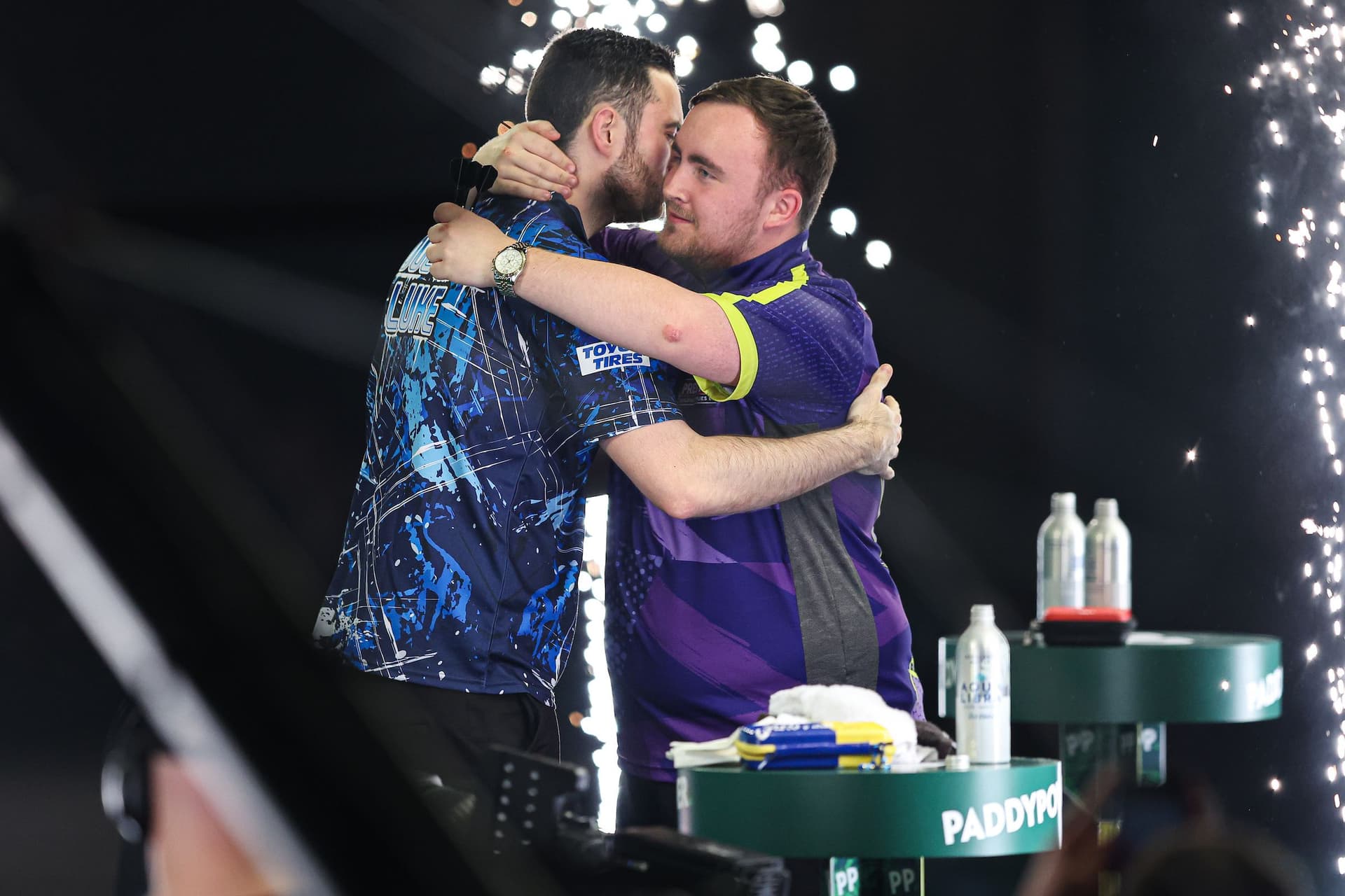 darts rivals hugging