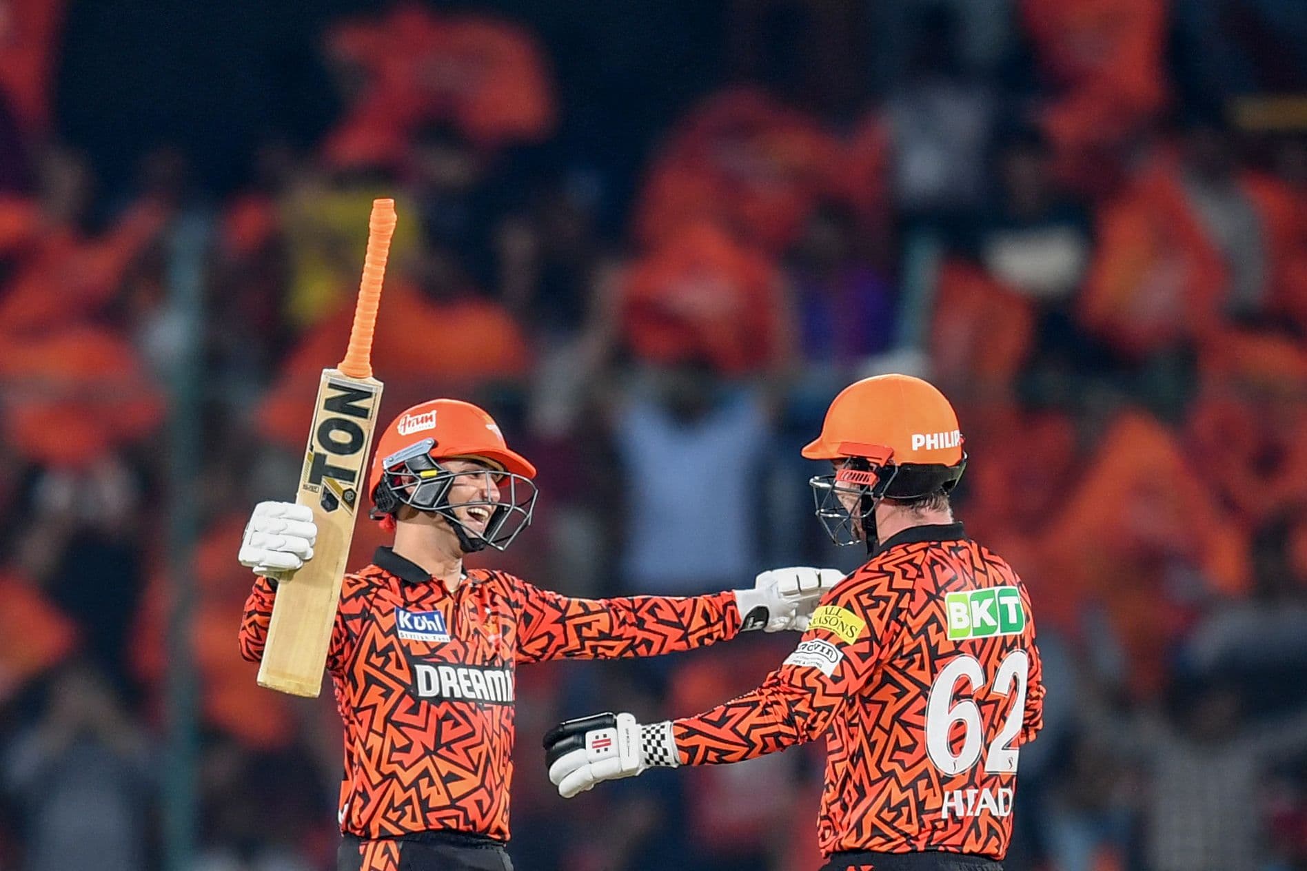 Abhishek Sharma is congratulated by Travis Head