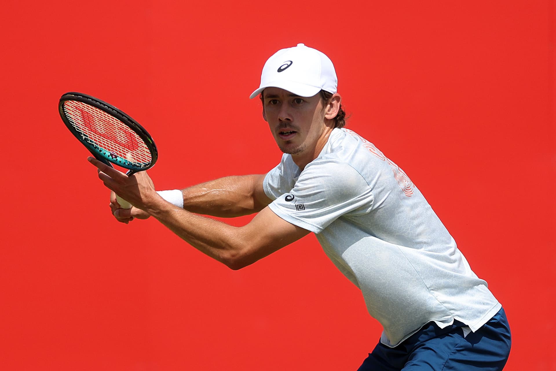 Alex De Minaur of Australia plays a forehand in a practice session
