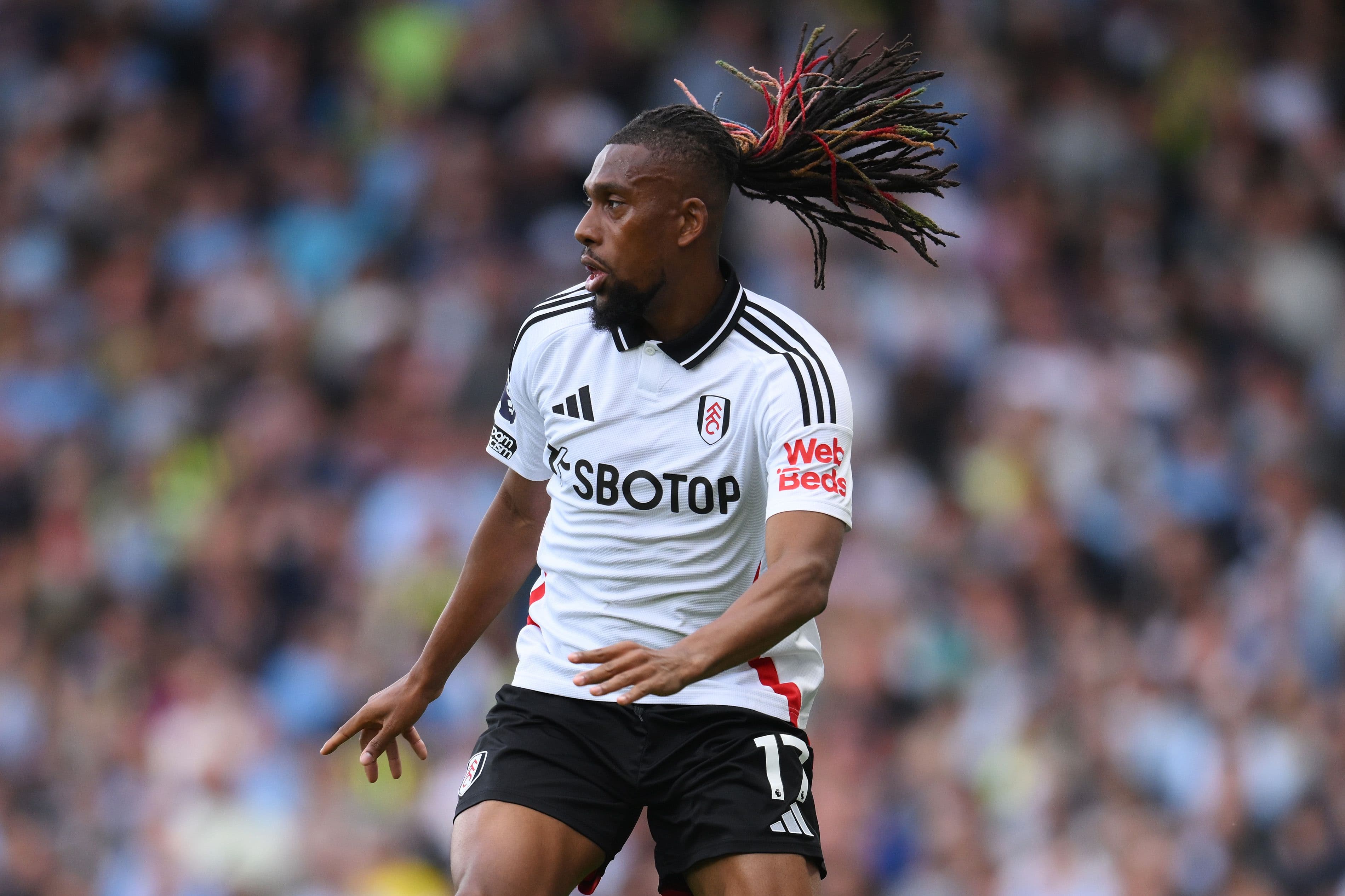 Alex Iwobi of Fulham in action during the Premier League match
