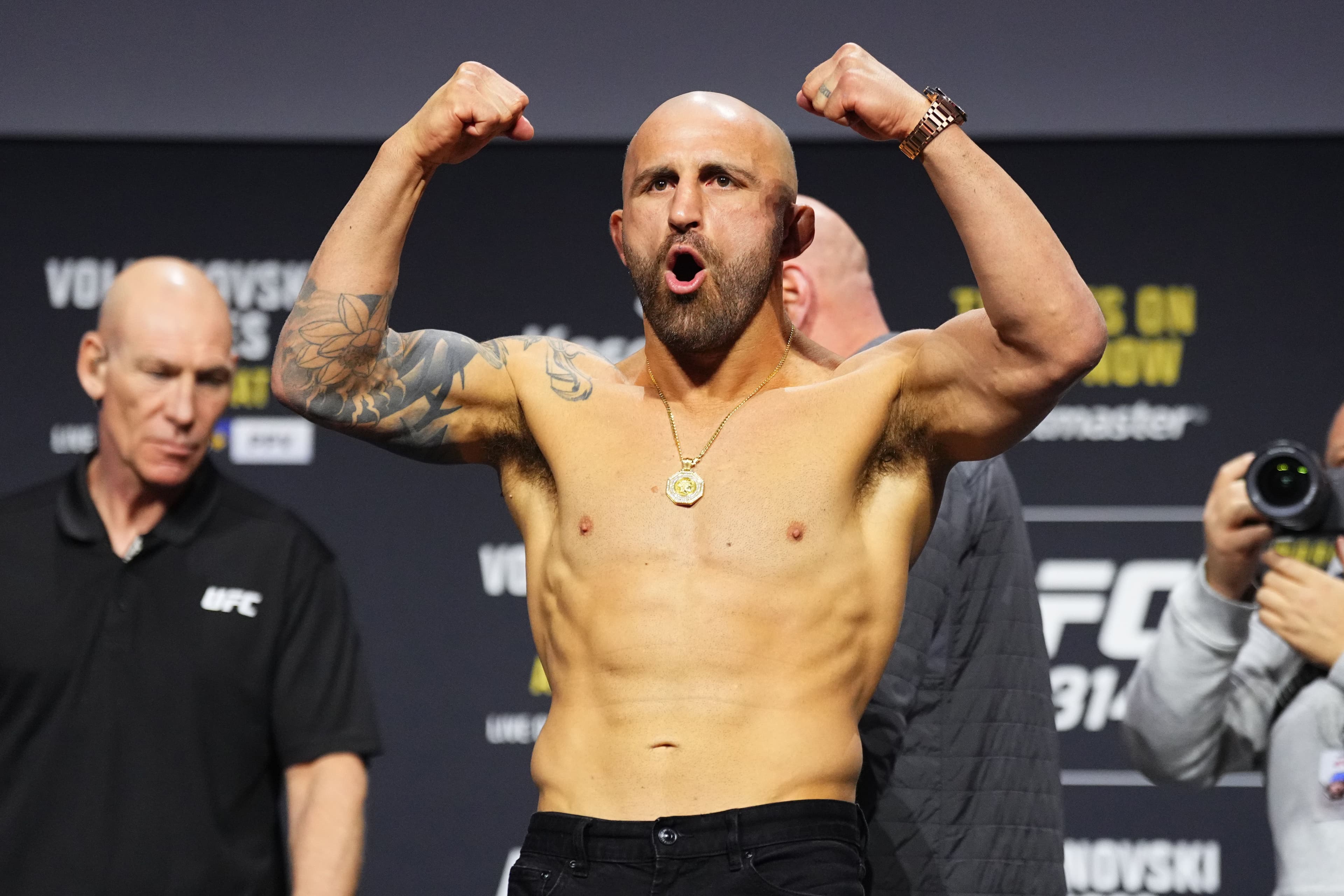 Alexander Volkanovski is seen on stage during the UFC 314 press conference