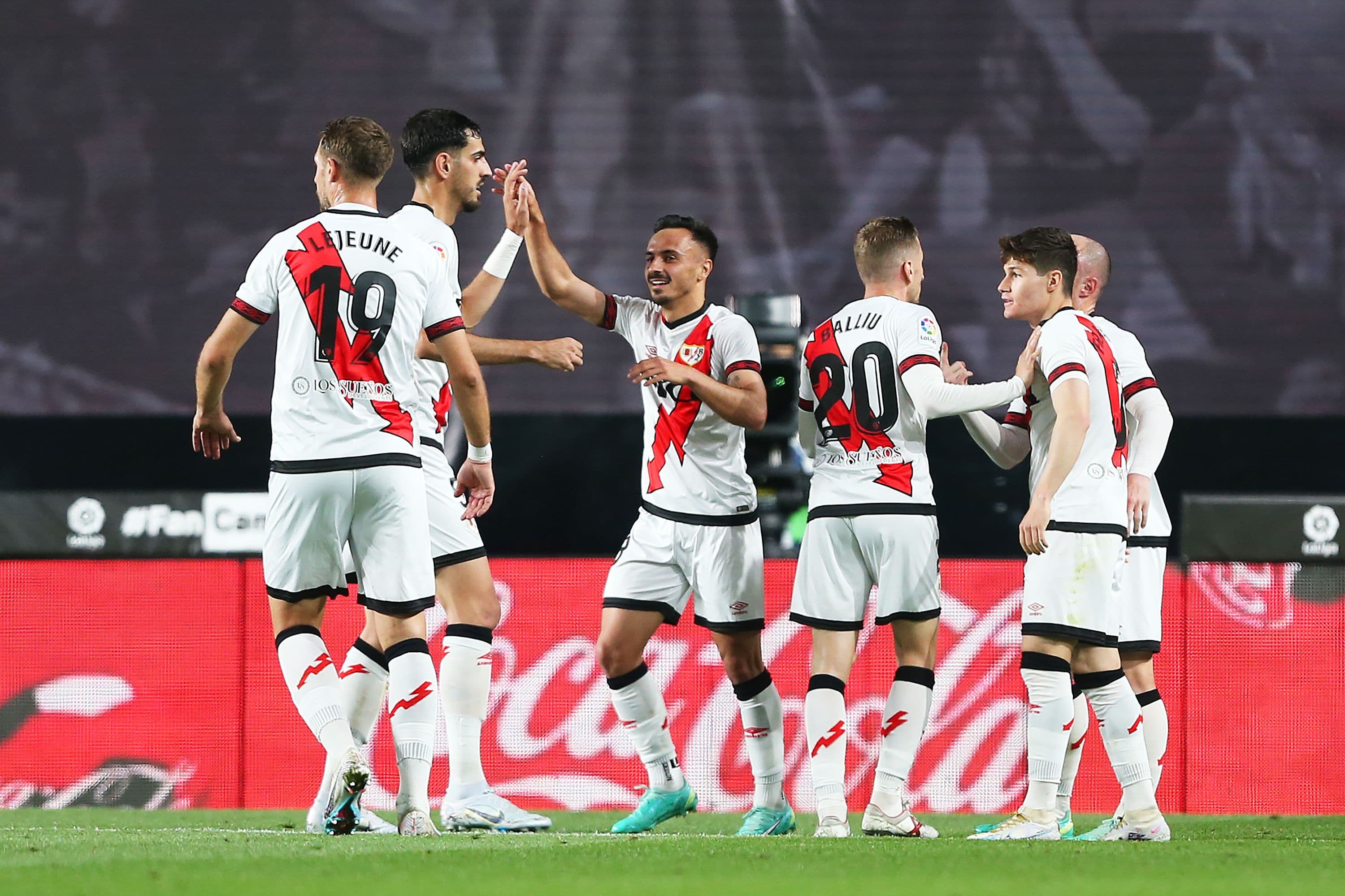 Alvaro Garcia of Rayo Vallecano celebrates with teammates after scoring the team's first goal