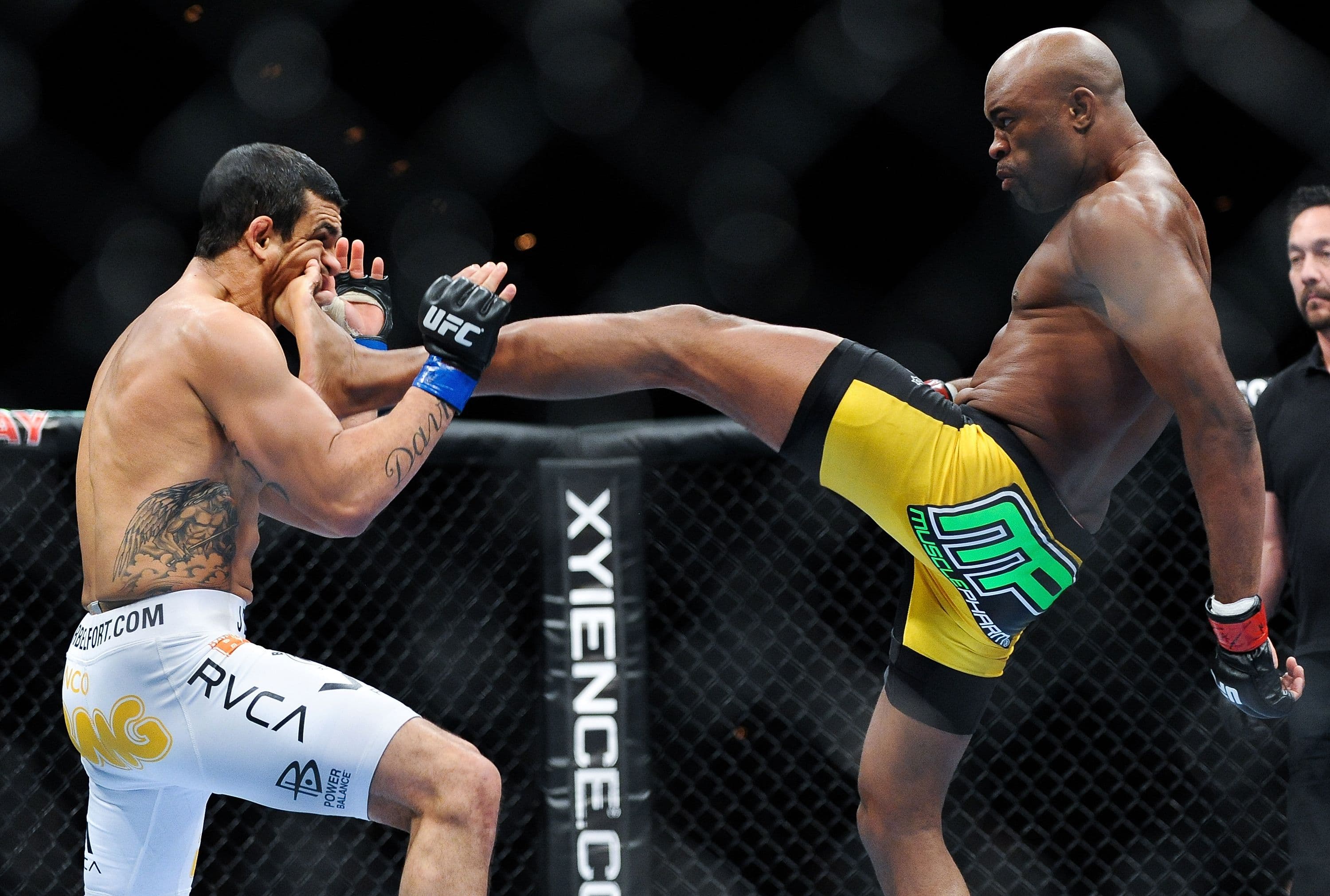 Anderson Silva lands a kick to the jaw of Vitor Belfort