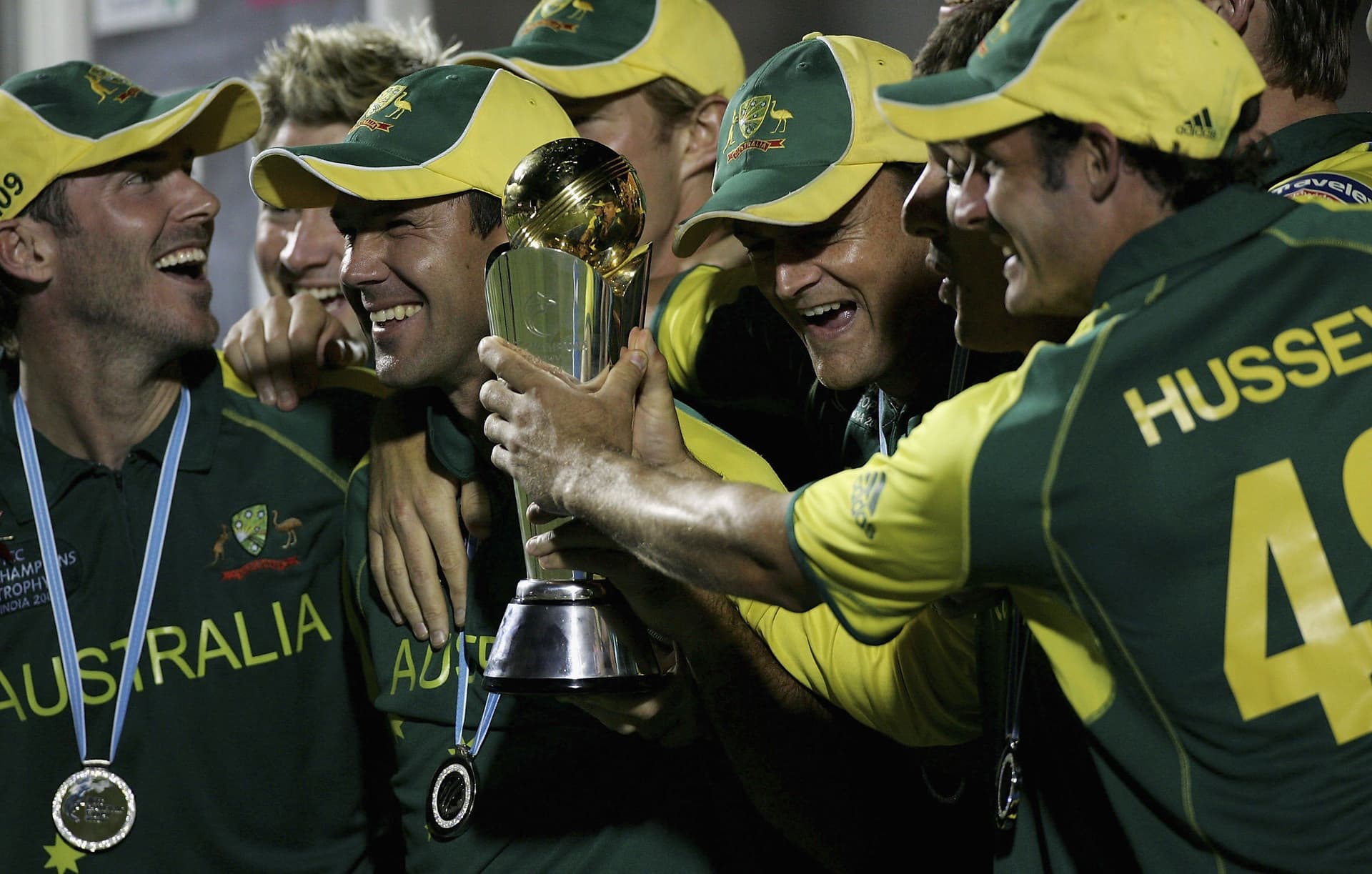 Australian players celebrate with the trophy