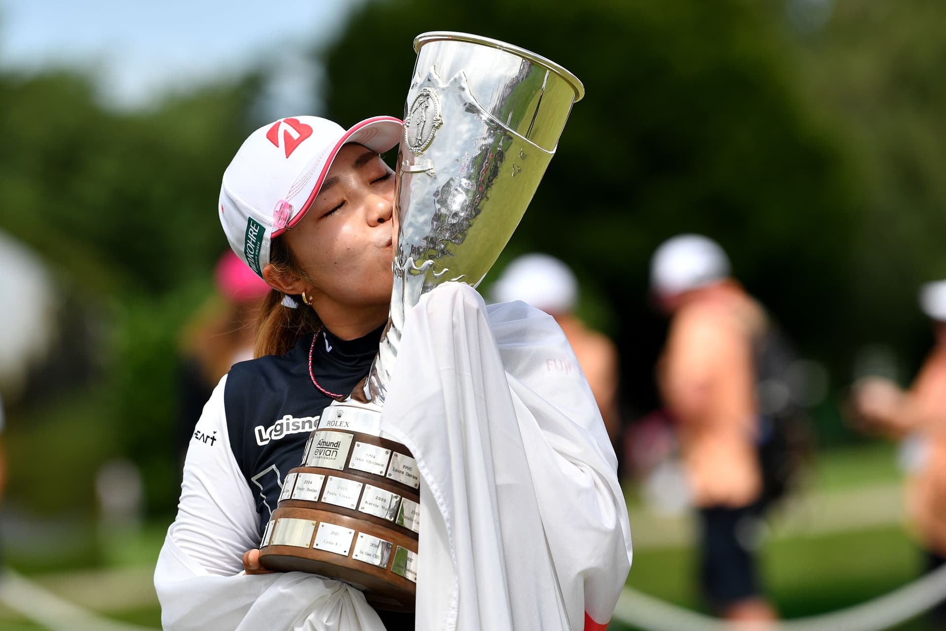 Ayaka Furue of Japan poses with the trophy after wining the Amundi Evian Championship