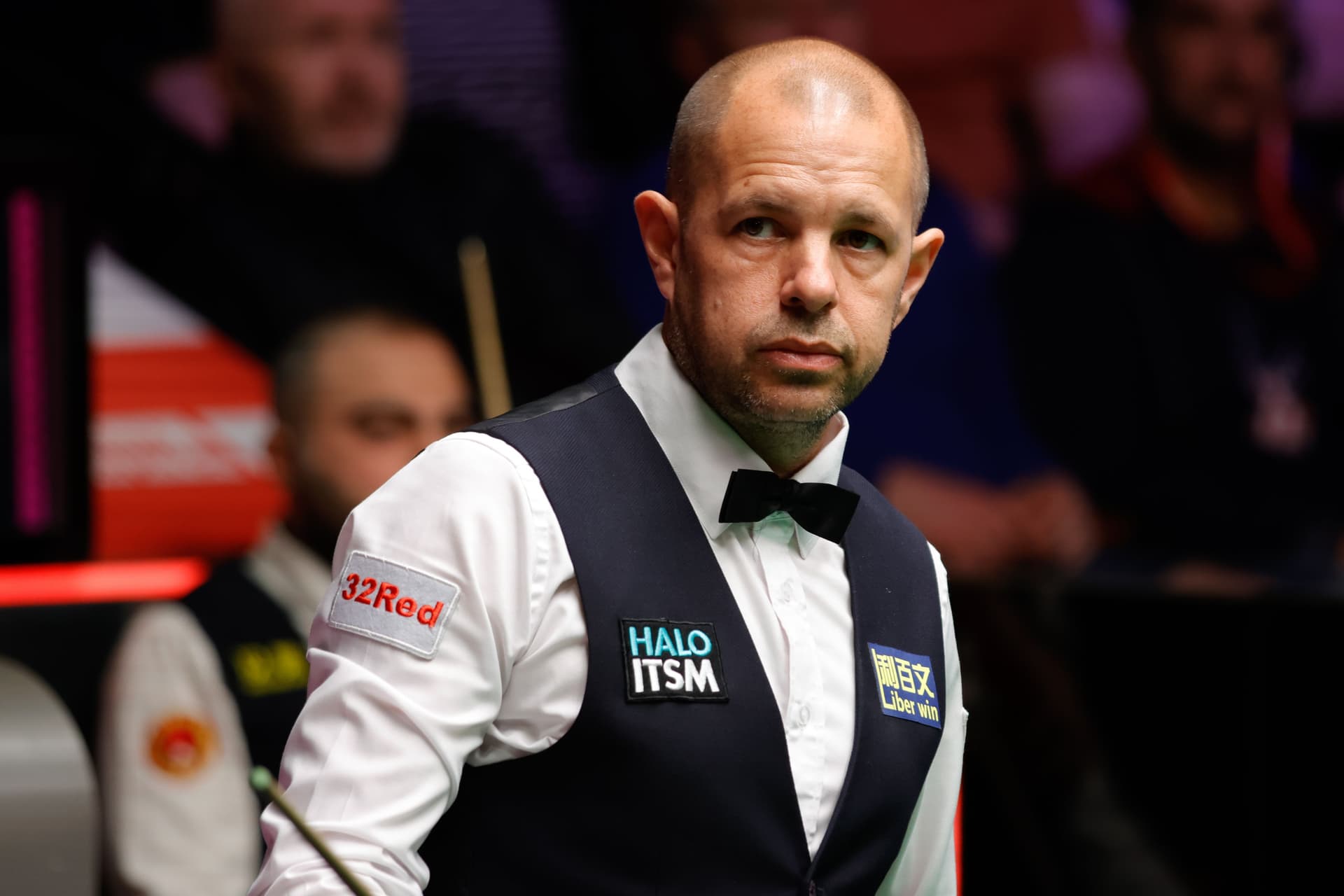 Barry Hawkins of England reacts in the first round match against Hossein Vafaei