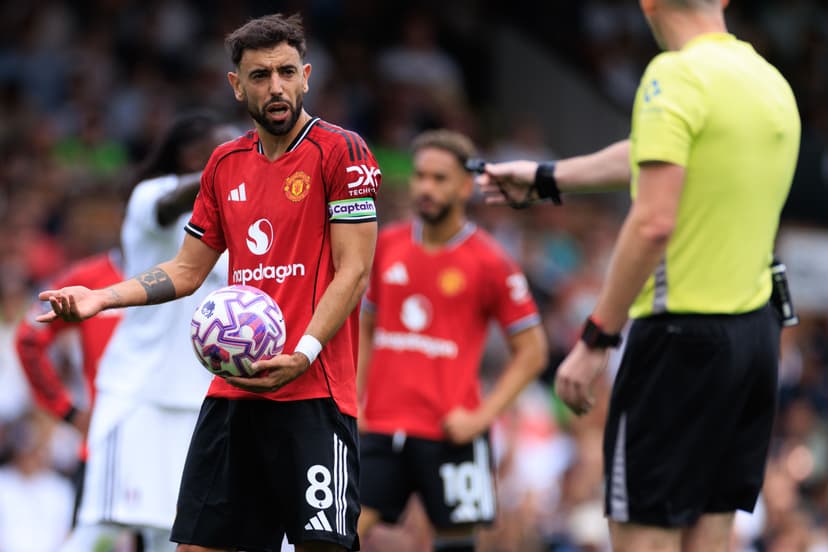 Bruno Fernandes of Manchester United reacts toward Referee Chris Kavanaghbefore missing his penalty during the Premier League