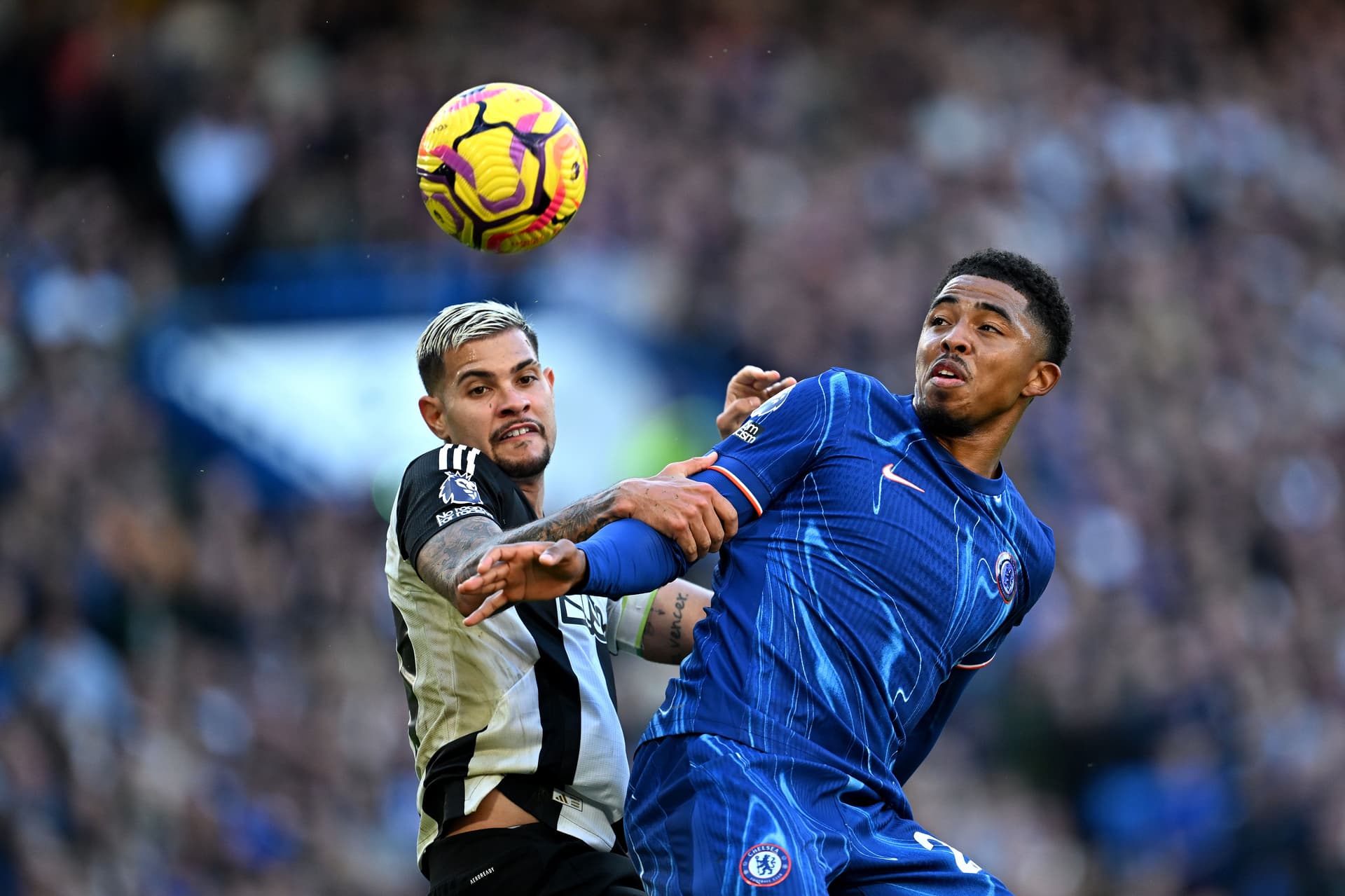 Bruno Guimaraes battles for possession with Wesley Fofana