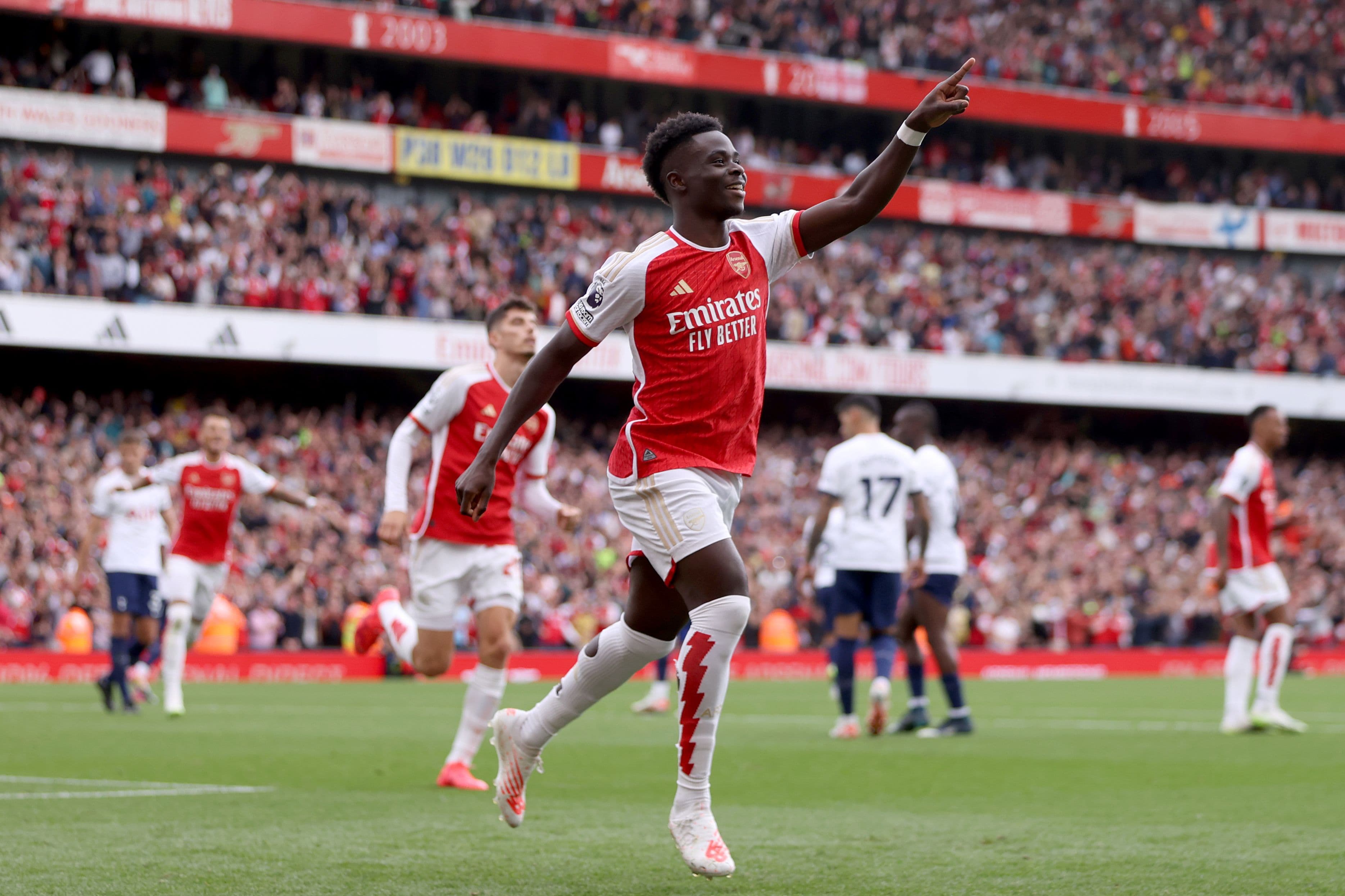 Bukayo Saka of Arsenal celebrates after scoring the team's second goal