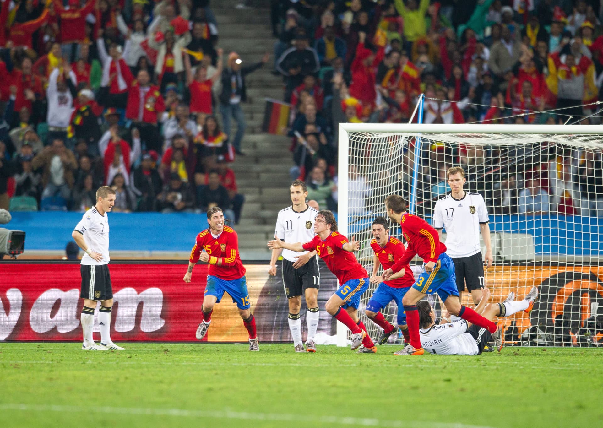 Carles Puyol of Spain celebrates with David Villa ,Sergio Ramos and Gerard Pique