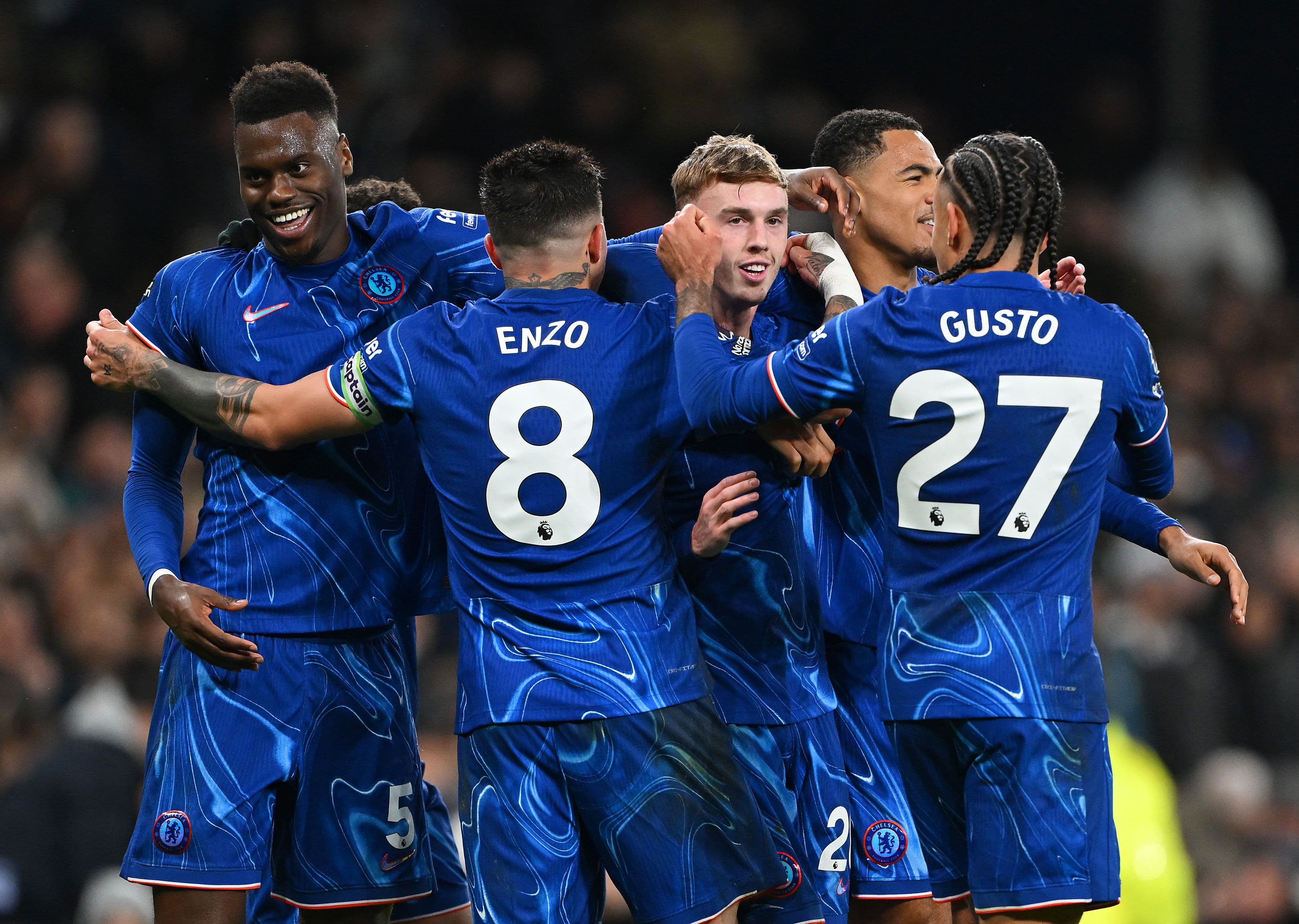 Cole Palmer of Chelsea celebrates scoring his team's fourth goal from the penalty spot