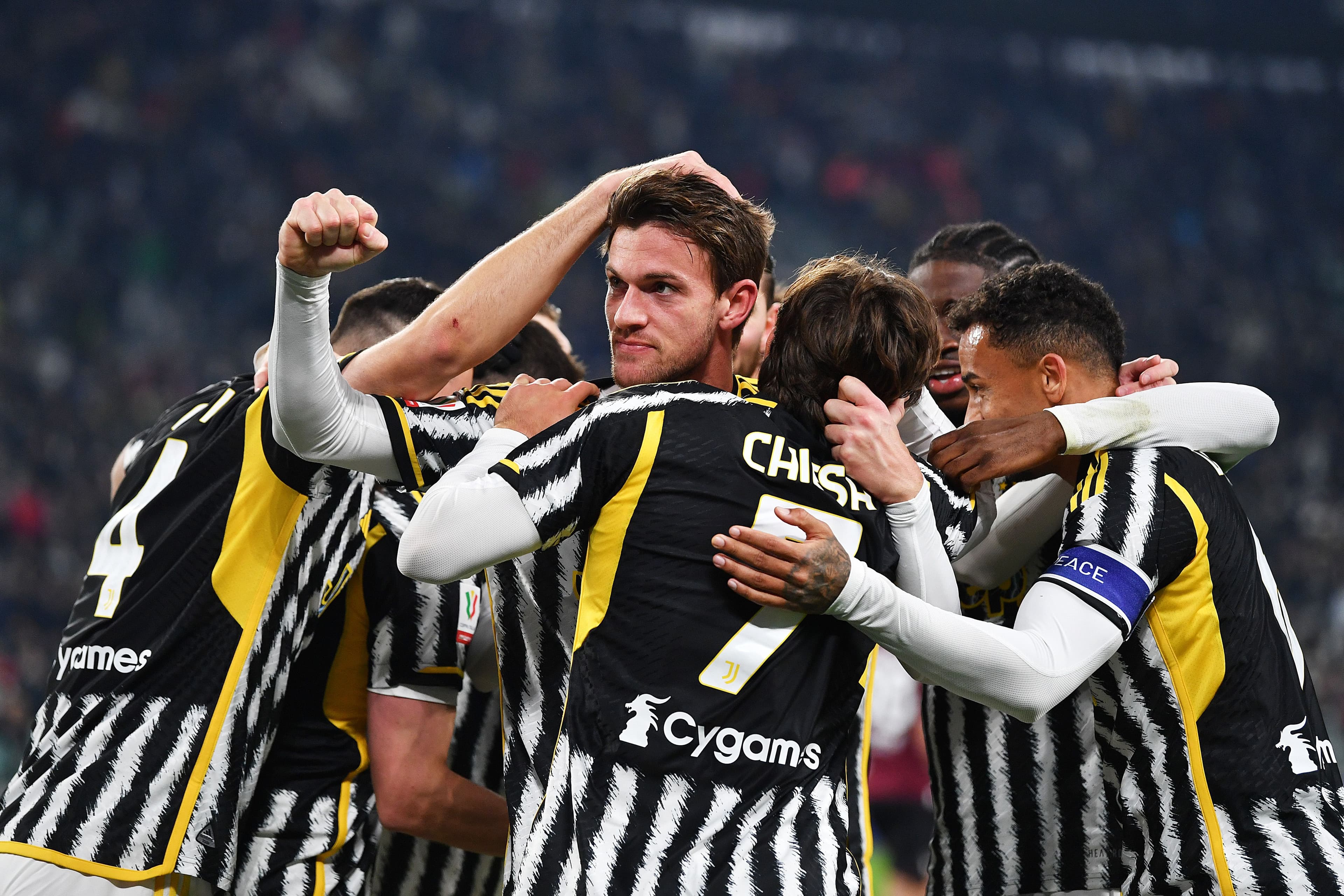 Daniele Rugani of Juventus celebrates with teammates after scoring their team's third goal